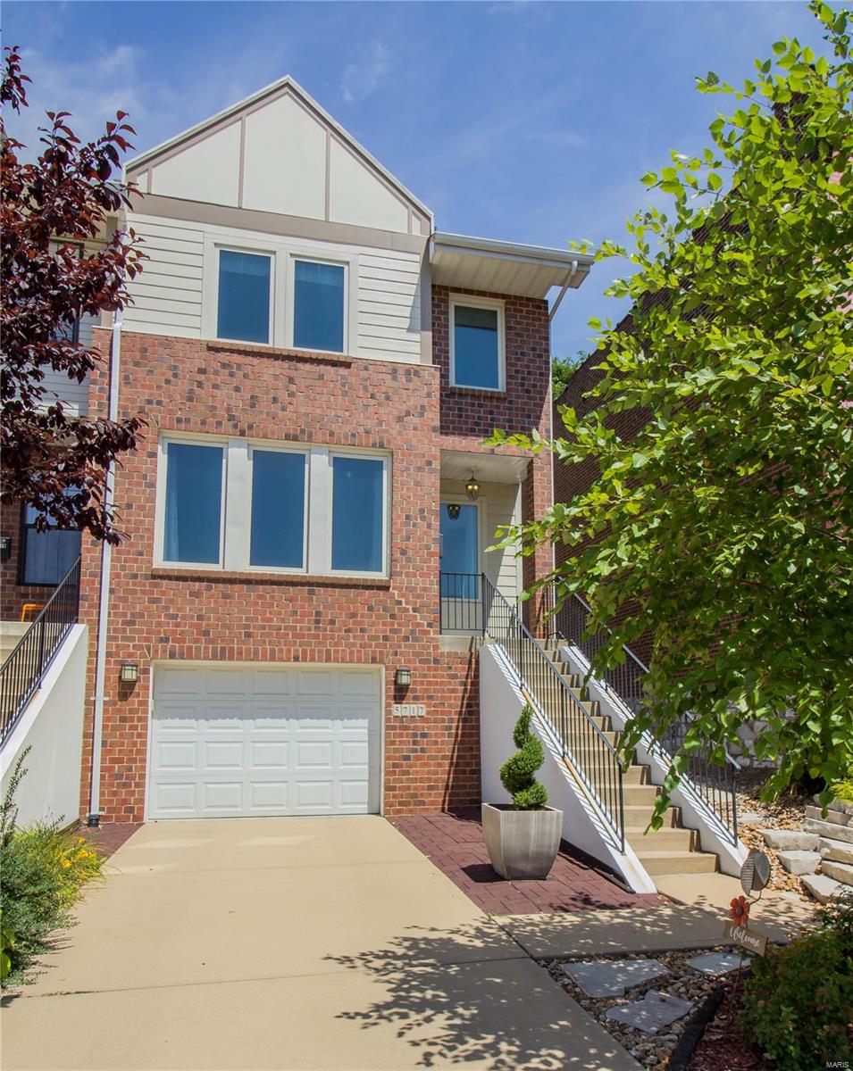 Prime location, walking distance to "The Hill", close to Sublet Park, Botanical Gardens, Forest Park, and HWY 44. Enjoy the townhome lifestyle with NO HOA fees! Welcoming and radiant this three-bedroom home features gleaming hardwood floors and contemporary finishes. The main floor features a dining room/living room space, half bath, large open kitchen, breakfast area, and large family room with gas fireplace. The designer kitchen includes dark stained cabinetry, granite tops, glass backsplash, and stainless steel appliances. Through the great room, there is access to the fully fenced yard, complete with pavers and maintenance-free decking, perfect for entertaining. Upstairs you will find two large guest bedrooms, a full bath, second-floor laundry, and a master bedroom which features a massive walk-in closet and an en-suite bathroom. Many updates including newer 2 A/C units and quality Anderson windows, along with a two-car garage with extra storage!