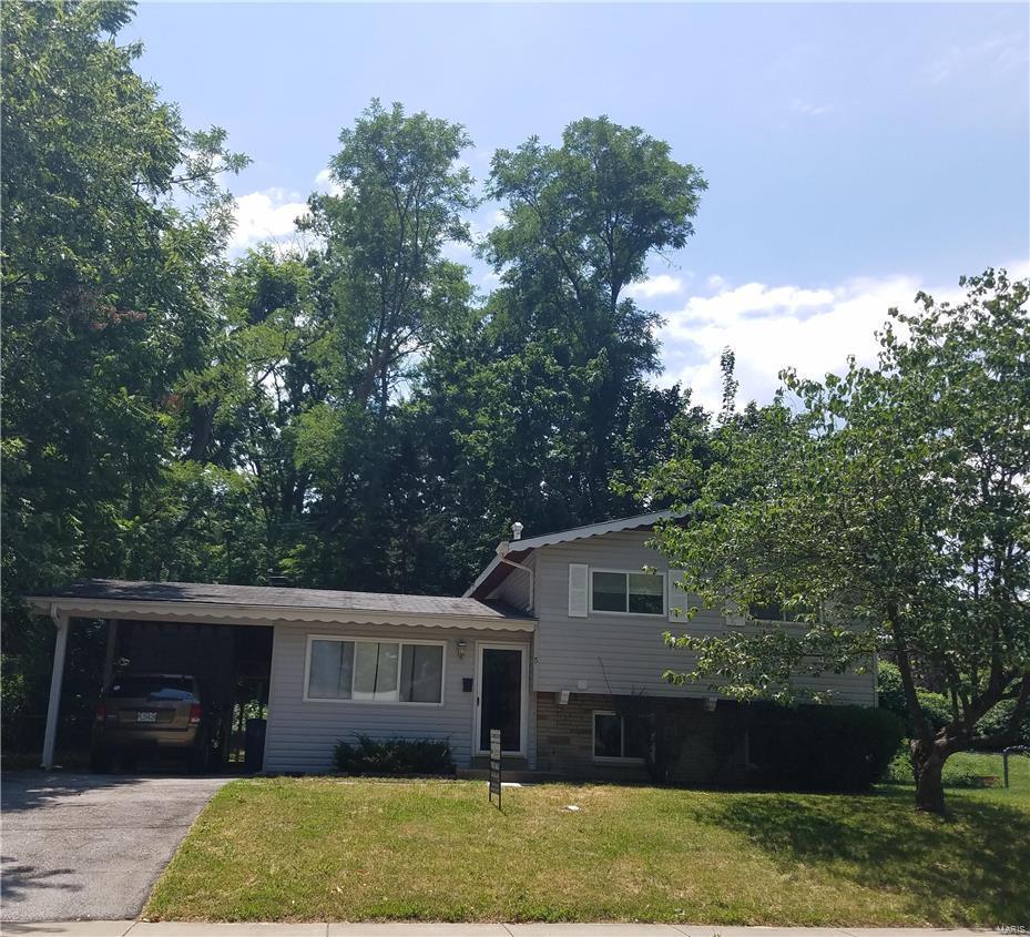 5 Trinity Lane sits on a quiet block in Florissant, MO.  It has 3 bedrooms on the upper level and 1 full bath.  The lower level can be used as a family room or a 4th bedroom, with another full bath on that level as well.  Lower level has a walkout door to a spacious yard that backs to neighbor's yard.  This is a bank owned property being sold "As-Is"; seller's to make no repairs or inspections.  This could be a great property for a new home owner or an investor looking for a solid property! SpecialListingConditions: Foreclosure