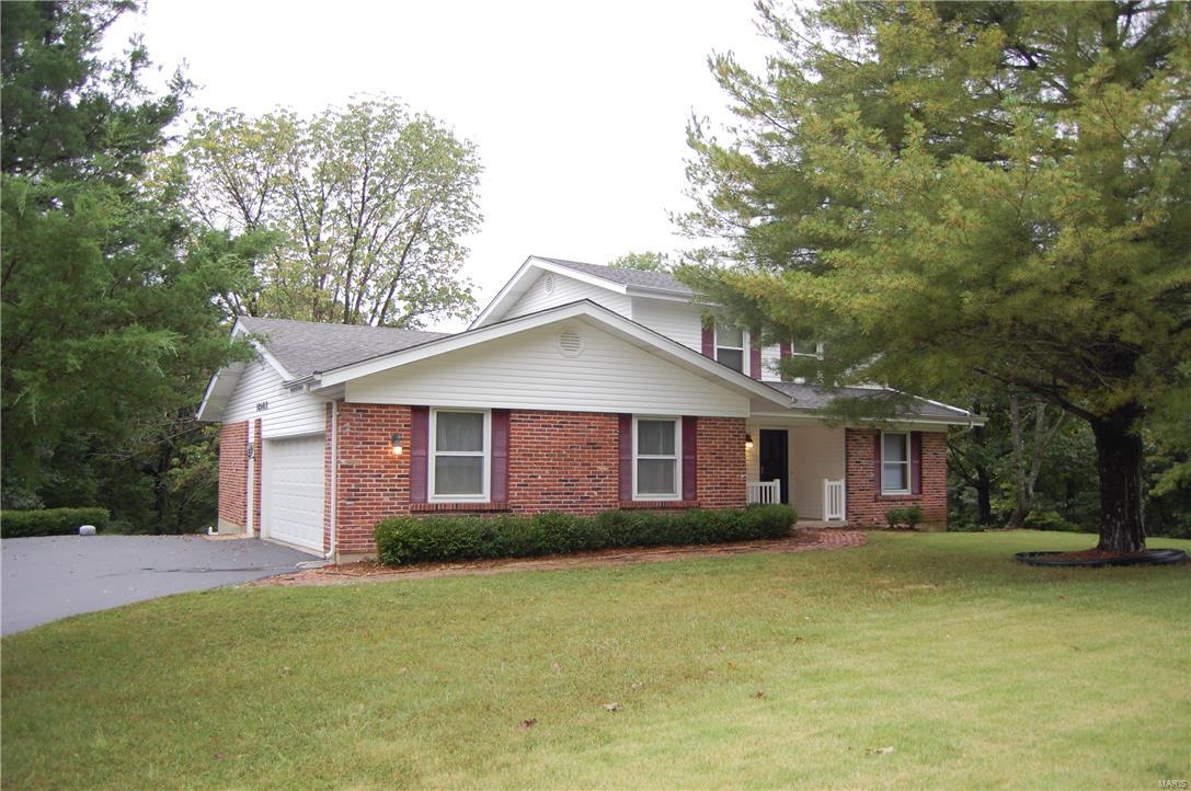 You will love this beautiful home that gives you the best of both worlds! Nestled on a private acre lot, this secluded property is still close to restaurants, shopping and schools. Well-maintained 4 bedroom 3 bath home is newly remodeled and ready for occupants. New carpet and paint throughout, and newer kitchen appliances. Unfinished basement has plenty of storage. Large deck overlooks private wooded area. AAA-rated Rockwood schools. Electric refrigerator, stove, and microwave included. Washer/dryer hookups.
