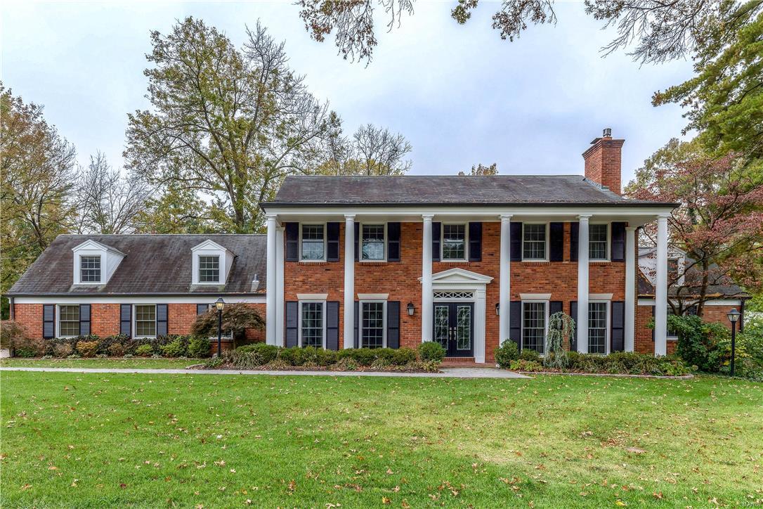 Spectacular renovation! Classic-styled brick 1.5 Sty features best-in-class improvements, fixtures & amenities. Gracious hardwood foyer leads to formal living & dining rooms with refinished oak floors & extensive millwork, striking family room with built-in bookcases, floor-to-ceiling Travertine marble fireplace & chef’s kitchen with cypress-lined cathedral ceiling, marble countertops, cherry cabinetry, commercial grade appliances, 10’ center island & convenient planning center. Vaulted master bedroom suite offers an appealing retreat with walk-in & double closets & luxury bath with laundry center. Hardwood floors continue to the 2nd level with a 2nd bedroom suite, 2 additional bedrooms, office & hall full bath. Walk-out Lower Level is ideal for casual entertaining with huge recreation room, family room with fireplace, 2nd kitchen, dining area, guest suite & pool bath. Outdoor living area includes resort style pool & 8-jet spa surrounded by landscaped gardens plus patio with fire pit.