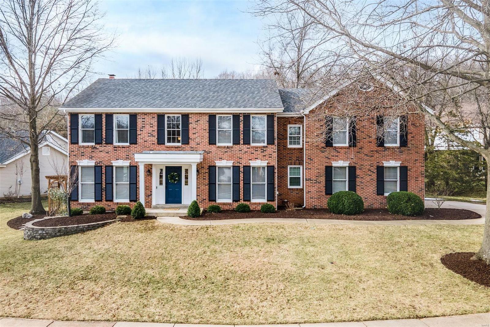 Storybook living in highly sought after Pointe Clayton subdivision & award winning Rockwood Schools!  Every aspect of this 2 story, 5 bedroom home has been lovingly updated. Enter the 2-story foyer w/ living room & separate dining room. Inviting family room w/ fireplace & wet-bar adjoins to large sunroom w/ plenty of room to create your own space. Chef's white kitchen w/ all new stainless appliances, Quartz counters, center island, and breakfast area overlook beautiful patio and gardens.  Attached three-season room for al fresco dining complete first floor.  Oversized primary suite w/ newly remodeled bath w/ large double sink vanity, spa-like rain shower, and tile surround. Four additional generous bedrooms w/ walk-in closets, study space, updated full hall bath, & upstairs large new laundry room. Lower level has rec room, newly added full bath, and tons of storage.  Two-car heated garage, new irrigation system, plus community pool,  tennis & pickle ball courts.  This is the life!