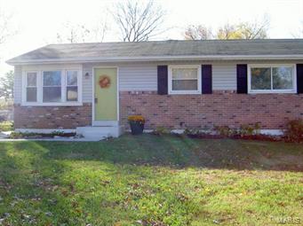 New Price! Sold "AS IS". Freshly painted throughout, new front concrete walk and landing, fresh landscaping. This home has lots of space for a growing family. Original home had 3 bedrooms and a bath. An addition to the home brought a main floor family room and a master bedroom suite with walk-in closet and full bath with whirlpool tub. There is a need for a new hot water heater for the master bath. All the plumbing is intact for that room as well as the new ceramic tile wall and flooring. A new roof was put on 3 years ago.  The lower level has a huge rec/rm and large utility room with  drain tile installed and a sump pump. No water came in during these last heavy rains. All appliances stay. There are thermal windows in most rooms.
Very affordable for this size home in the Lindbergh School District. Kitchen can use some "sprucing up". Floor coverings need replacement and hardwood floors need sanding.