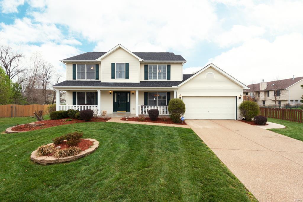 Discover the unmistakable beauty of this enchanting 2-story on a cul-de-sac in popular Villages at Dardenne subdivision with amenities galore-3 pools, walking trails and tennis court. Gleaming white bookshelves accenting a gas fireplace take center stage in the cottage-style Family Room, which elicits coastal charm in the breezy color palette, plantation shutters, bay window and hardwood floors. A classes white Kitchen with granite counters & backsplash, bay window and stainless steel appliances has an airy feel. L-shaped staircase leads up to Loft, the perfect place to play! Roomy Master Suite boasts walk-in closet and dual sinks. A super-sized patio with pergola offers a lovely outdoor space for entertaining throughout the seasons with room to run in the level backyard. Finished Basement with Rec Room, Sleeping Area & Bathroom, bringing total living area to 3,600+ SF! Enjoy extra storage in the garage extension (9'x10'). Newer carpet, Irrigation system. Fort Zumwalt West Schools.