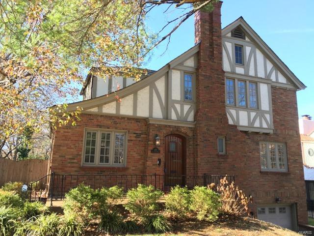 Don't miss this opportunity! Steps away from downtown Clayton, Metrolink, I-170, Washington University & Flynn Park. This lovely 4 bed 2.5 bath English Tudor is located on a cul-de-sac in the exclusive Alta Dena neighborhood. Original floors, arched doorways, crown molding & architectural details are reminiscent of the past, while a gourmet eat-in kitchen with waterfall-edge granite counters, high-end stainless steel appliances, marble tile floor and Cherry cabinets give you all the modern amenities. Main floor features a Living room with fireplace, Dining room, 1/2 bath and a first floor Bedroom/Office.  The sweeping open staircase leads to 3 more Bedrooms and 2 full renovated baths on the second floor. Additional UPDATES include: newer sewer lateral, zoned HVAC, jetted tub, energy-efficient windows, in-ground lawn irrigation, exterior lighting, professional landscaping, basement waterproofing, and a newer roof.