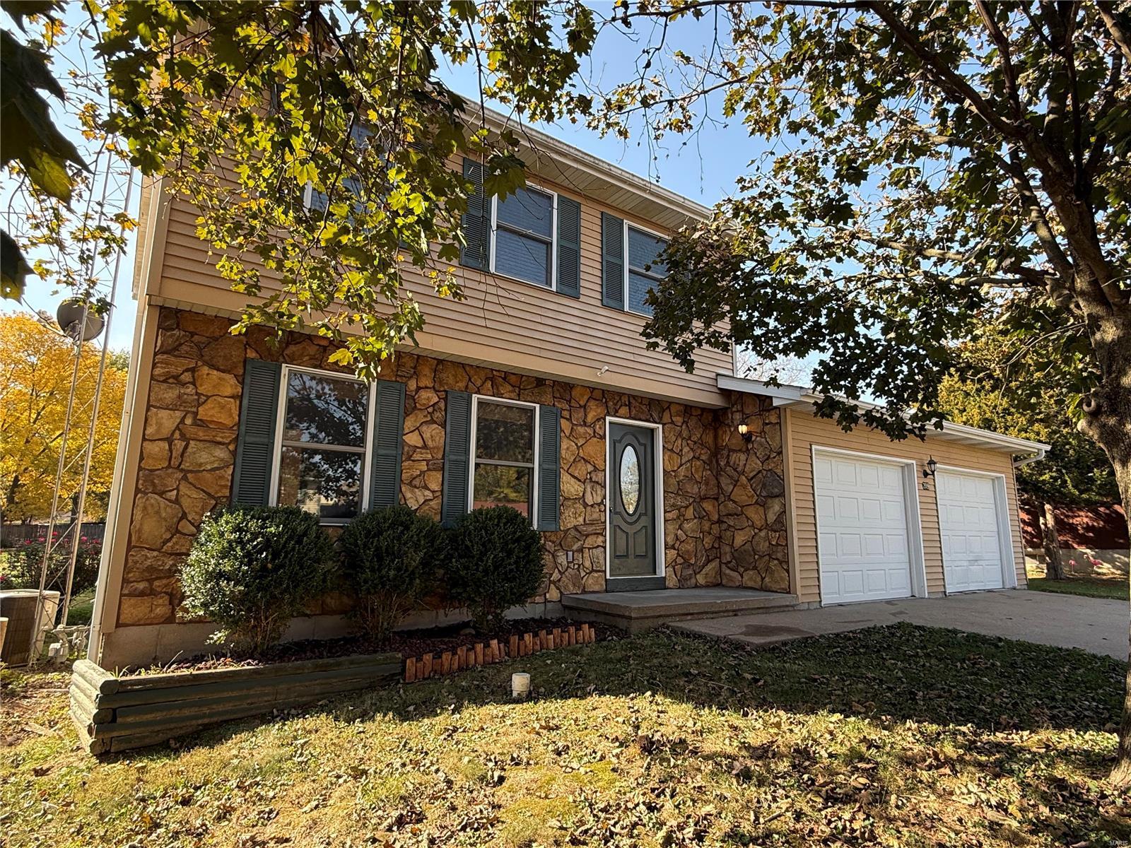 Welcome to this beautifully maintained 2-story home. This move-in ready gem is located just minutes from the historic downtown district, with easy access to shops, restaurants, and schools, making it an ideal place to call home. Step inside to find a warm and inviting living space. Kitchen is designed for functionality and style, with plenty of cabinet and counter space to make meal prep a breeze. Upstairs, you’ll find three spacious bedrooms, and a full bath. The partially finished basement with a wet bar, perfect for hosting friends or creating your own movie room. There’s also a convenient half bath on this level. Step outside to enjoy the concrete patio that overlooks a large, level lot—ideal for outdoor entertaining, barbecues, or simply relaxing in your own private oasis. The yard offers plenty of room to play, gardening, or even adding a future pool. The oversized two-car garage provides ample storage space for vehicles, tools, and other belongings. Call today, before its gone!