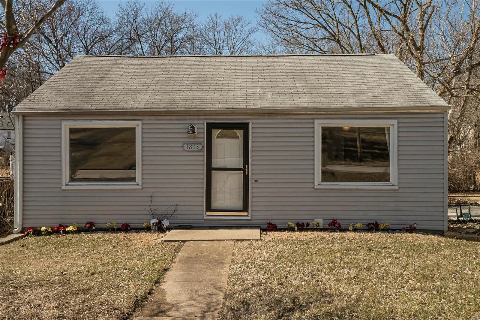 Full of charm, this is just minutes from all major highways, shopping and dining. Situated on a large lot with a large shed in back. Tons of modern updates enhance the original character of the home. The main level living room has a welcoming atmosphere with new laminate floors and a completely updated kitchen with new cabinets, countertops, and appliances. Main level bath has new tub surround and has been completely updated, two large bedrooms round out the main floor. The lower level has a gorgeous bedroom retreat complete with its own full bathroom. Double sliding glass doors let in tons of natural light and lead to the large backyard and deck.