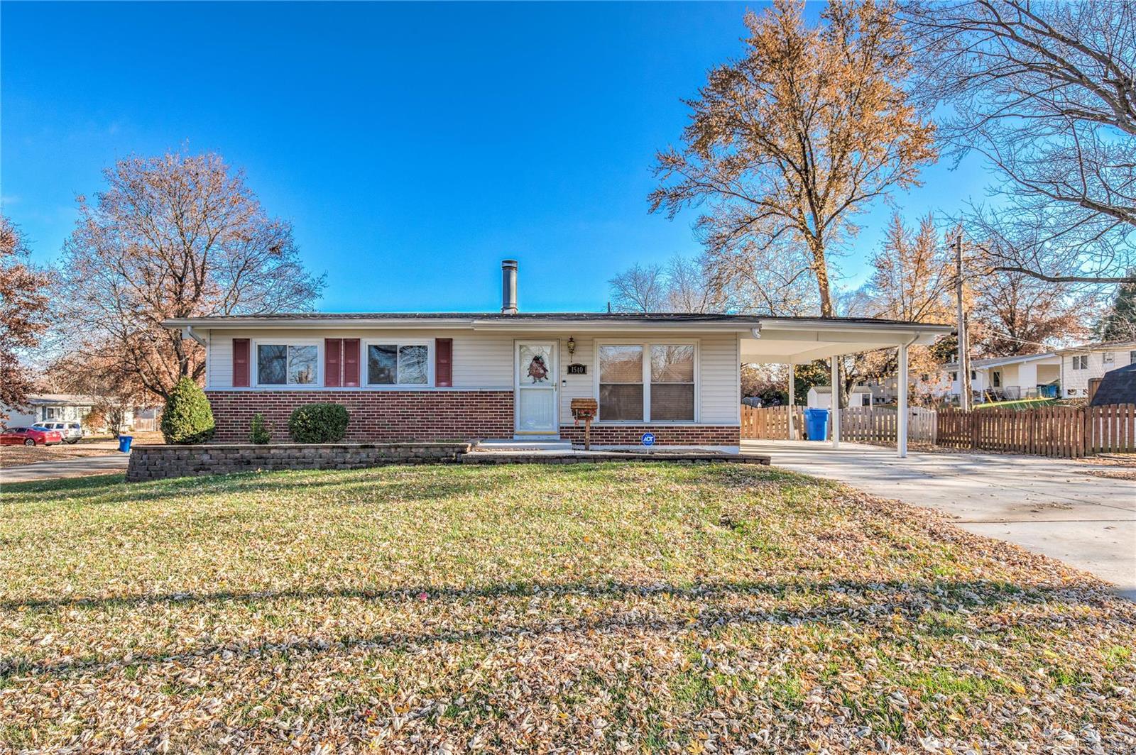 Beautiful Florissant ranch located on a large corner lot. This home has a new, as of Jan 2022, double driveway, sidewalk, and porch. Inside you will love this custom kitchen that features sliding drawers and organizers that you can change as desired. The gas stove and hood are 1 year old and there is a pantry for storage. The primary bedroom has a walk-in closet and much of the main floor has hardwood floors. The bathroom is updated. Double doors lead out to a stunning deck that leads to a patio and fenced backyard. There is also a shed for extra storage. The basement is finished offering additional living space and has a fireplace. The roof on the house and shed is about 3 yrs old. Major systems, furnace, air conditioner, and water heater have all been updated within the last 5 years. This home is located near many shops and local municipal amenities.