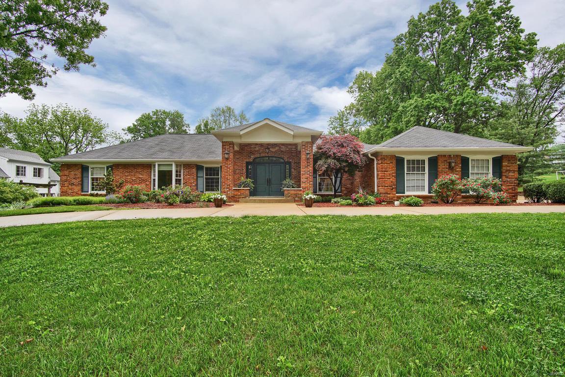 Beautiful custom-designed 5,924 SF luxury home in Frontenac! Home sits on a 1-acre level lot on a private, tree-lined street. This house was built for entertainment with an open floor plan, heated PebbleTec pool area w/Lanai and a circular driveway that can fit 20+ cars! The list of amenities just doesn’t stop. This 4BR, 5.5BA home features a 4-season Florida room, a granite-inspired chef’s kitchen outfitted by Gaggenau, Asko, Fisher Paykel, SUB-ZERO and Thermadore, an incredible Master BR suite & Master Bath w/jetted spa tub, HUGE walk-in shower w/hardware by Grohe, Tebisa & Toto and an amazing walk-in closet resembling a dressing room! Also warm your toes on the heated radiant floors! Home has 3 HVAC zones, 2 water heaters, gas fireplace, office area, main-floor laundry, crown molding, tray ceilings and a 3-car garage with 4th storage bay! Finished lower level has a full kitchen, full bath and walk-out access. This is a great house located on a great street & is a definite must see!