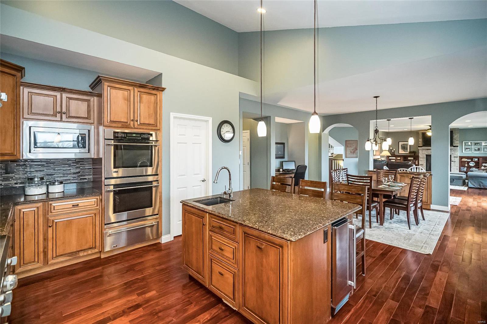 Incredible home on 4+ acres boasting over 5,200 sq ft of true refinement.  Located in Southern Lincoln county, this amazing executive home offers finished walk out lower with 5th bedroom, full bath and pool access as well as a 9' pour.  The impressive main showcases 2 story entry foyer with dramatic staircase, Brazilian hardwood floors, office, 2 half baths, oversized gas FP, separate dining, 9' ceilings and gourmet kitchen with glazed maple cabinetry, quartz counters, incredible appliances to include double convection ovens, custom fridge/freezer, warming drawer, warming shelf on the gas range, plus industrial vent hood and walk in pantry.  Upstairs you'll enjoy the 9' ceilings, coffered owner's suite complete with amazing bath...2 walk in closets, soaking tub and steam shower.  Outdoors you'll enjoy the pool, greenhouse and sep garage with HVAC, bathroom and race deck flooring.  Stunning home to say the least.  Plan to visit soon. We welcome you and we thank you.