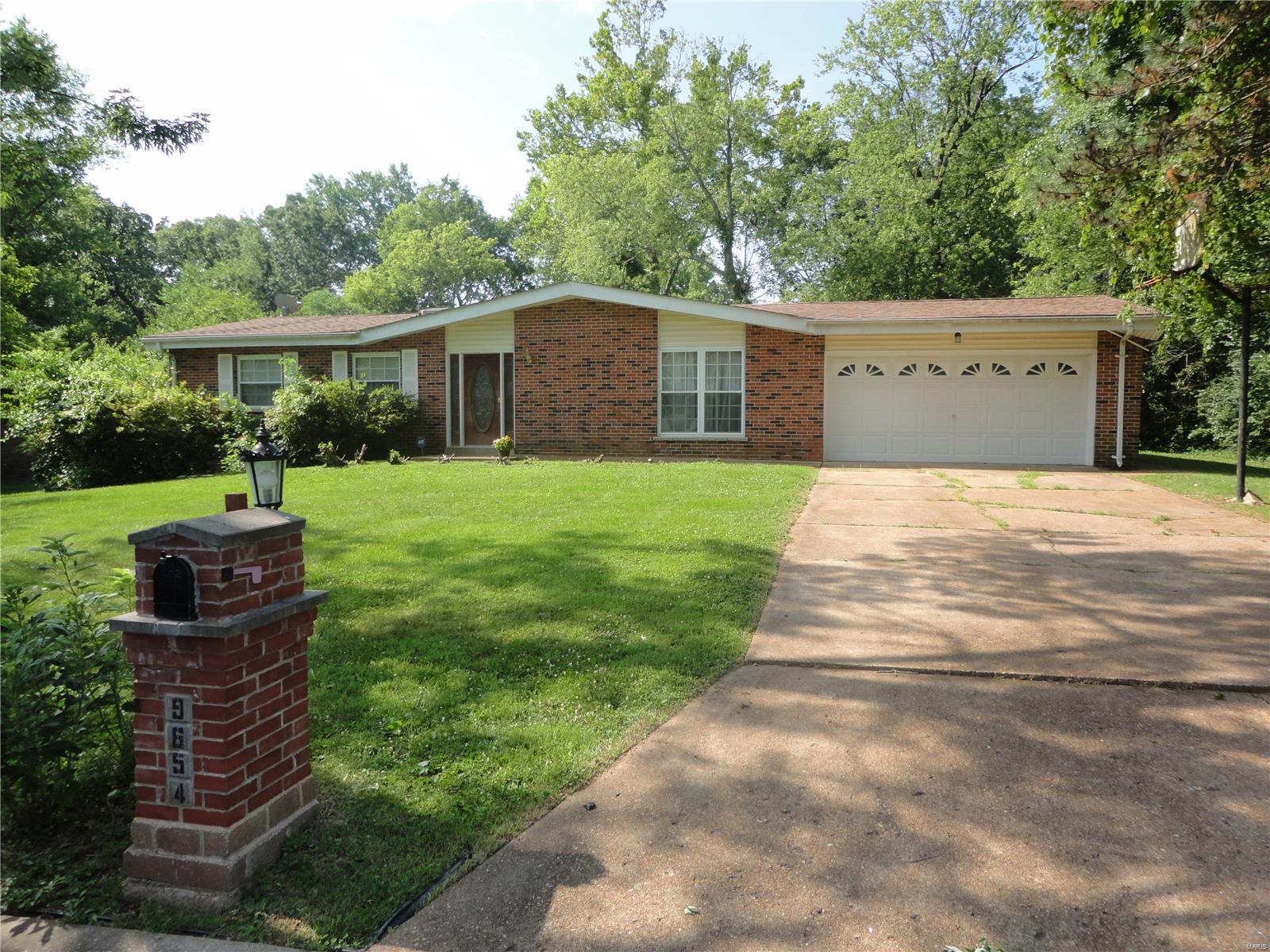 This spacious Home features 3 bedrooms and 2 full baths, along with 2 car over sized attached garage. Home is in need of lots of TLC, mainly cosmetic. Home is in the much sought after Ladue School District! You also have a main floor Family Room along with a lower level Family Room/Rec Room area. There is a kitchen eating nook that is great for catching some sun while relaxing with coffee or dinner. The laundry area has also been added to the main level of the Home as well. Lower level also has 2 additional rooms and plenty of storage room. Come see this Home and see all that it has to offer!