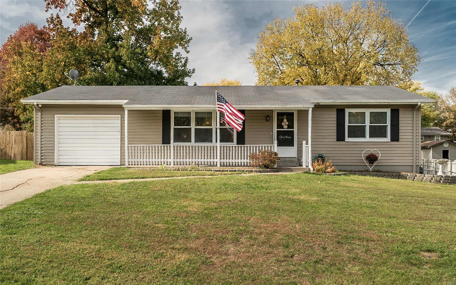 Welcome HOME to this cute, updated Ranch located in a calm and quiet subdivision.  Conveniently close to Hwy K, but without the noise.  This home features brand new wood flooring and carpet on both levels, and fresh paint throughout.  The main floor boasts an inviting entry foyer into the living room, a kitchen/dining combo, 2 ample sized bedrooms, and 1 bath.  The lower level has been partially finished and features a family area, PLUS 2 separate sleeping areas.  Enjoy family time and relaxation in your huge, fenced-in backyard, with mature trees and an electrical outlet primed for a swimming pool.  Don't let this one pass you by, make it YOURS today!!