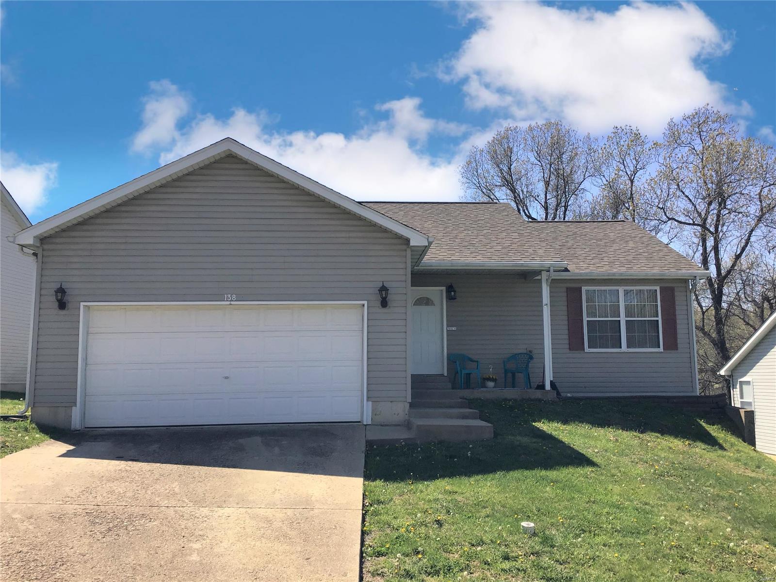 So much cuteness for just $145,000!! New paint, new carpets - even new toilets!  This adorable open concept ranch home has been re-done and is ready for move in! Located just about 10 minutes to the main gate of Ft. Leonard Wood, shopping and restaurants makes this one sweet location. Family friendly neighborhood.  Waynesville Schools.  Plus, there's an extra large storage area in the basement (28x11) with so much potential. It can easily be turned into a family/rec room, if so desired. The kitchen has plenty of cabinets, counters and even a pantry for extra storage.  The master suite provides a walk in closet and attached full bathroom with a dual vanity and a large soaker tub.  Feel free to bring the kids and pets, the yard is completely fenced.  Check it out soon - it won't last long!  Feel free to check out the cool virtual tour!
