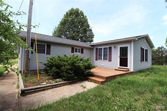Great Home, Great Price. Three bedroom, two bath home in Waynesville, MO close to Fort Leonard Wood. Recently remodeled throughout, this home feels bright and fresh. Lot's of natural light. Home has large living/dining areas and a roomy Master bedroom! Let the kids out to play in the big, secluded backyard or sit out on the big front deck to enjoy the quiet scenery. Country-Feeling area with a short drive to I-44 for easy access. Call today to schedule your showing!