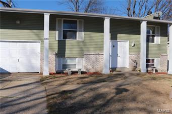 Beautifully UPDATED home with 42" Cherry Oak Cabinetry and all stainless steal appliance. Fridge will stay. Newer thermal sliding door with blinds in closed in glass and newer vinyl flooring in kitchen and dining room. Newer carpet on main floor. Newly installed carpet in lower level as of Dec 2015. New hot water heater and entry foyer floor in Dec 2015. Additional insulation was blown in 2015. This insulation is treated with bug proof and is transferable to new home owner. Living room, hallway, kitchen, dining room and family room freshly painted in Dec 2015. You can relax on those spring mornings enjoying your coffee on this 20X13 deck. 

Must see this home to appreciate its coziness.