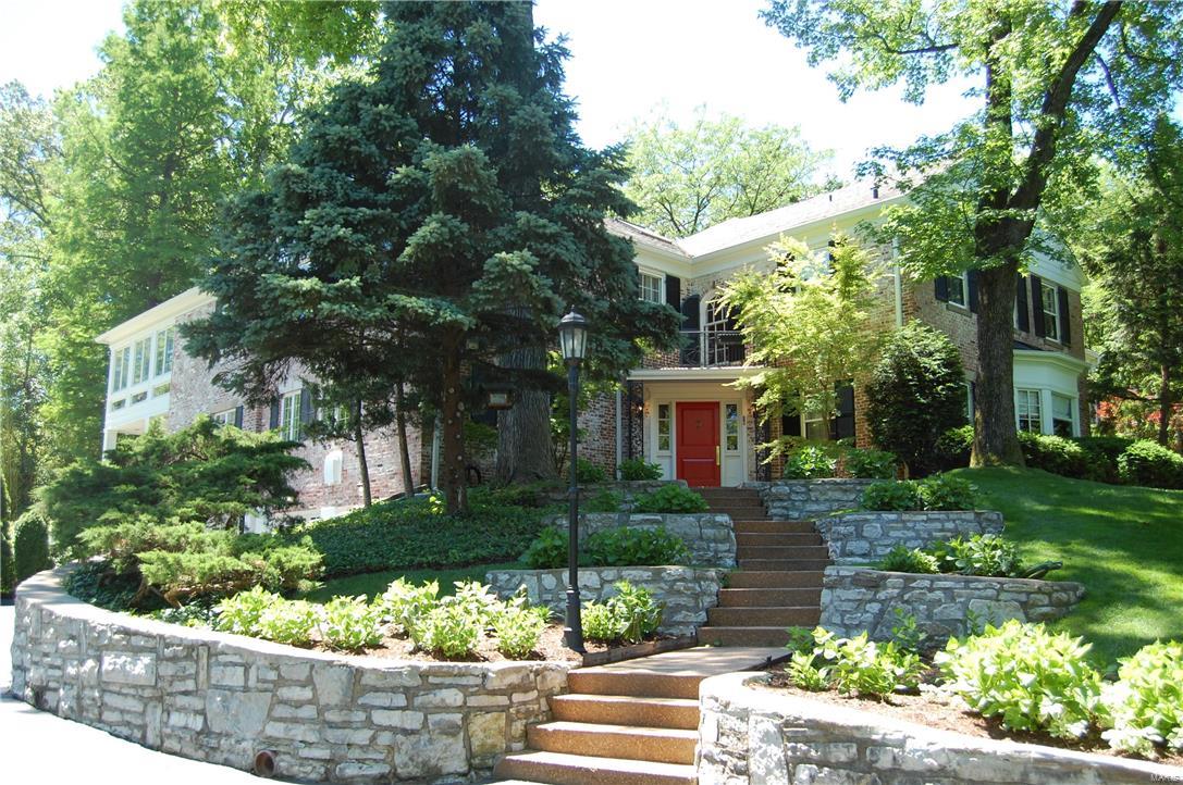 One of the largest lots in Ladue's executive Briarcliff subdivision, with 1.5 acres; including a park-like 1/2 acre play yard. Expansive room sizes of this classic Ladue homee exceed expectations, more like those found at the nearby Saint Louis Country Club. (Please Click MovieReel Icon or VirtualTour). European inspiration fills the detailing of this exceptional luxury home; brick patios, outdoor lighting & lavish resort-setting. Key notes include a secluded saltwater pool & waterfall. $2,400,000 invested in this 5BD/6BA home, totaling 7,100SF. A modern and functional lifestyle w/a balance of formal and informal living areas. Main Level features an impressive gourmet eat-in kitchen, Library/den and glassed gallery. The Master is a separate and full wing on the 2nd level, w/separate His&Hers baths, closets, dressing rooms, sitting room w/FP and a private hangout w/pool views. 4 other BR's (2, suites). All-brick, custom lighted courtyard. Extensive improvements.
