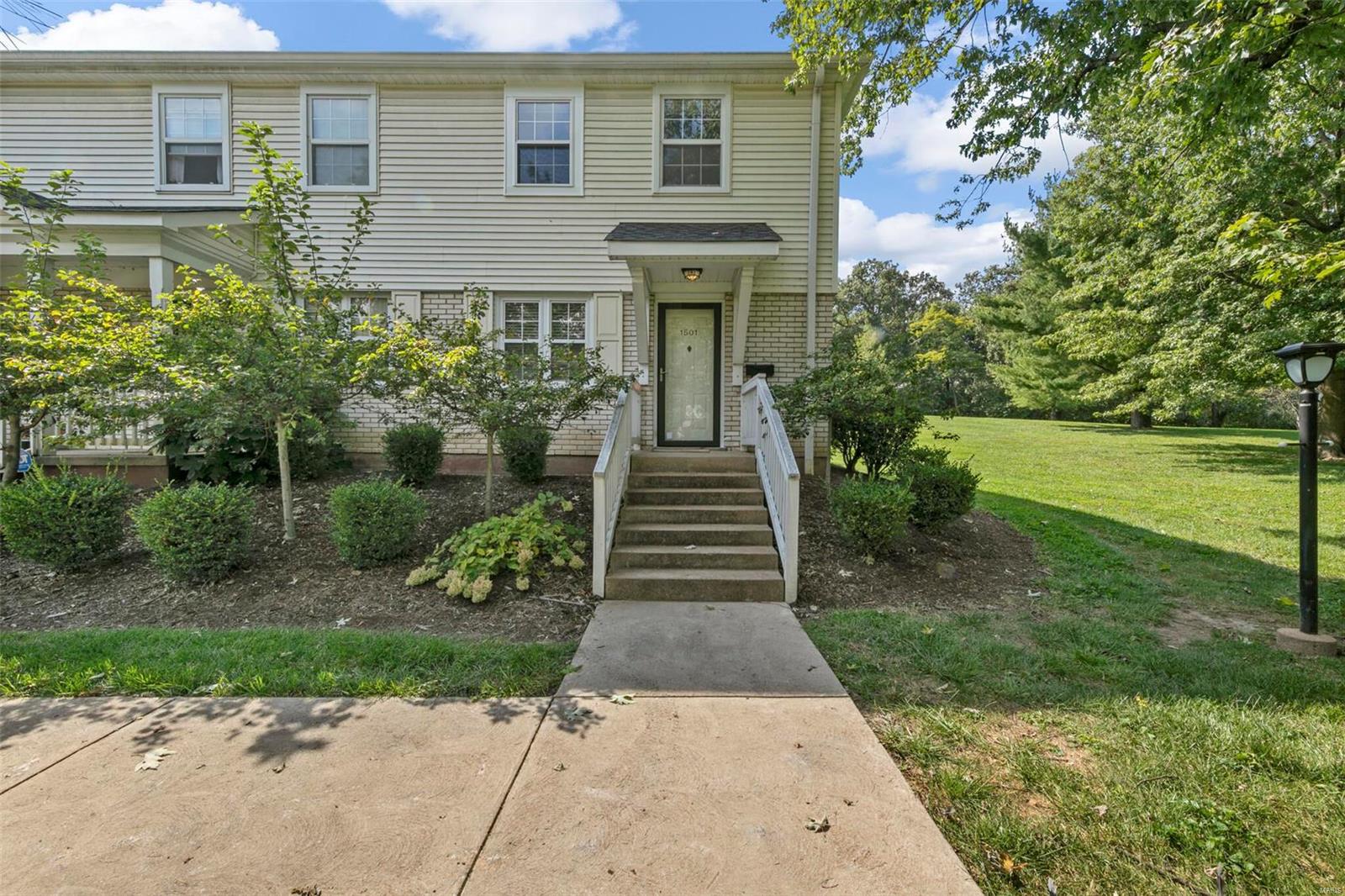 LOCATION, LOCATION, LOCATION! Hard to find 'End-Unit', move-in ready with tremendous amount of common ground surrounding condo in the desirable Brentwood Forest neighborhood. Set in a beautiful botanical filled landscaped setting, unit has been completely repainted, has brand new carpet in the bedrooms, updated kitchen appliances, granite countertops and updated bathroom. Washer and dryer in unit and will stay, custom built extra storage in attic, custom closet on first floor under stairs, unit has been meticulously maintained! Enjoy your morning coffee in wonderful serenity on the patio with an amazing view of over 2 acres of park-like setting. Off street parking for you and your guests, as well as 2 swimming pools, tennis courts, clubhouse, Lake Jefferson and walking trails! Location: End Unit