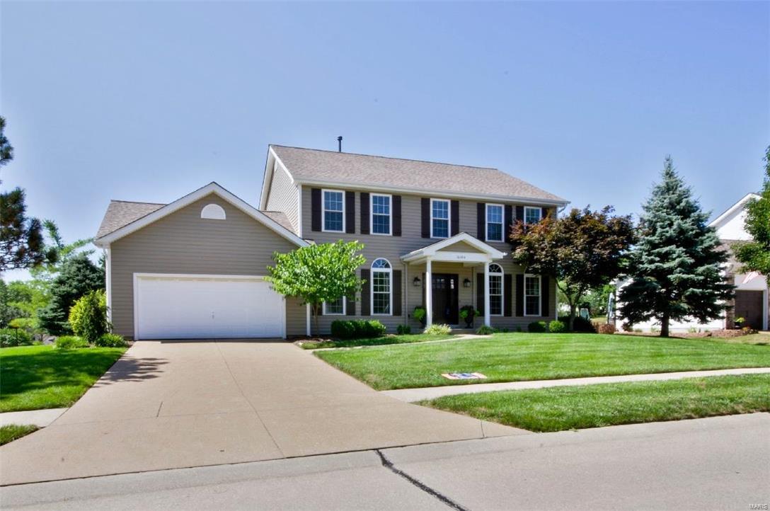 Beautifully appointed & meticulously maintained throughout, this lovely 2 story home situated on a gorgeous landscaped lot. This classic 5 bedroom 3.5 bath radiates elegance & style. Attention to detail in every room. From the inviting 2 story foyer follow exquisite cherry hardwood floors into a large dining room. Continue to family room w/ gas fireplace, custom built-in bookcases & wall of windows that let in tons of natural light. Crown molding throughout the whole house! The kitchen will amaze you! All new ss appliances, Viking 6 burner, down draft gas range, breakfast bar, granite counters & custom tile back splash. Upstairs you will find a spacious master suite w/ luxury bath, 3 addt'l bedrooms & full bath. Stunning finished lower level w/ den, 5th bedroom, handsome full bath, built in storage shelves & a workshop. Rock wool insulation adds sound proofing & fire retardance. Zoned hvac, dual hot water heaters. Be sure to see the list of upgrades- too many to mention here!