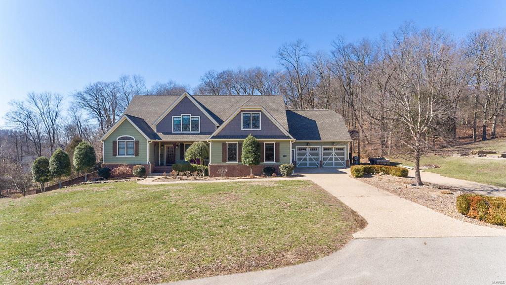 A gorgeous house, 8.49 acres, barn, private setting, AND within minutes to Cape or Jackson...don’t wait to see this property! The 7 bedroom, 6 bathroom home, features a gourmet kitchen, 2 gas fireplaces, screened in deck, theater room... the list goes on and on. The main level master suite includes an adjoining office area & walk in closet w/ custom shelving.  Enjoy cooking in the spacious kitchen complete w/ plenty of room for your family gatherings. Or have a more intimate dinner in the separate dining room. When you walk into the house from the 4 car garage, you will find cubbies & shelves to keep everyone organized.  A main & upper level laundry room makes laundry a breeze.  The finished, walk out lower level boasts a wet bar, family room, 2 beds & baths, & a theater room, including all furniture & 3-D projector.  Appreciate the outdoors w/ over 8 acres, a chicken coop, & large barn, which includes water and electricity. You must see this property to appreciate all it has to offer!