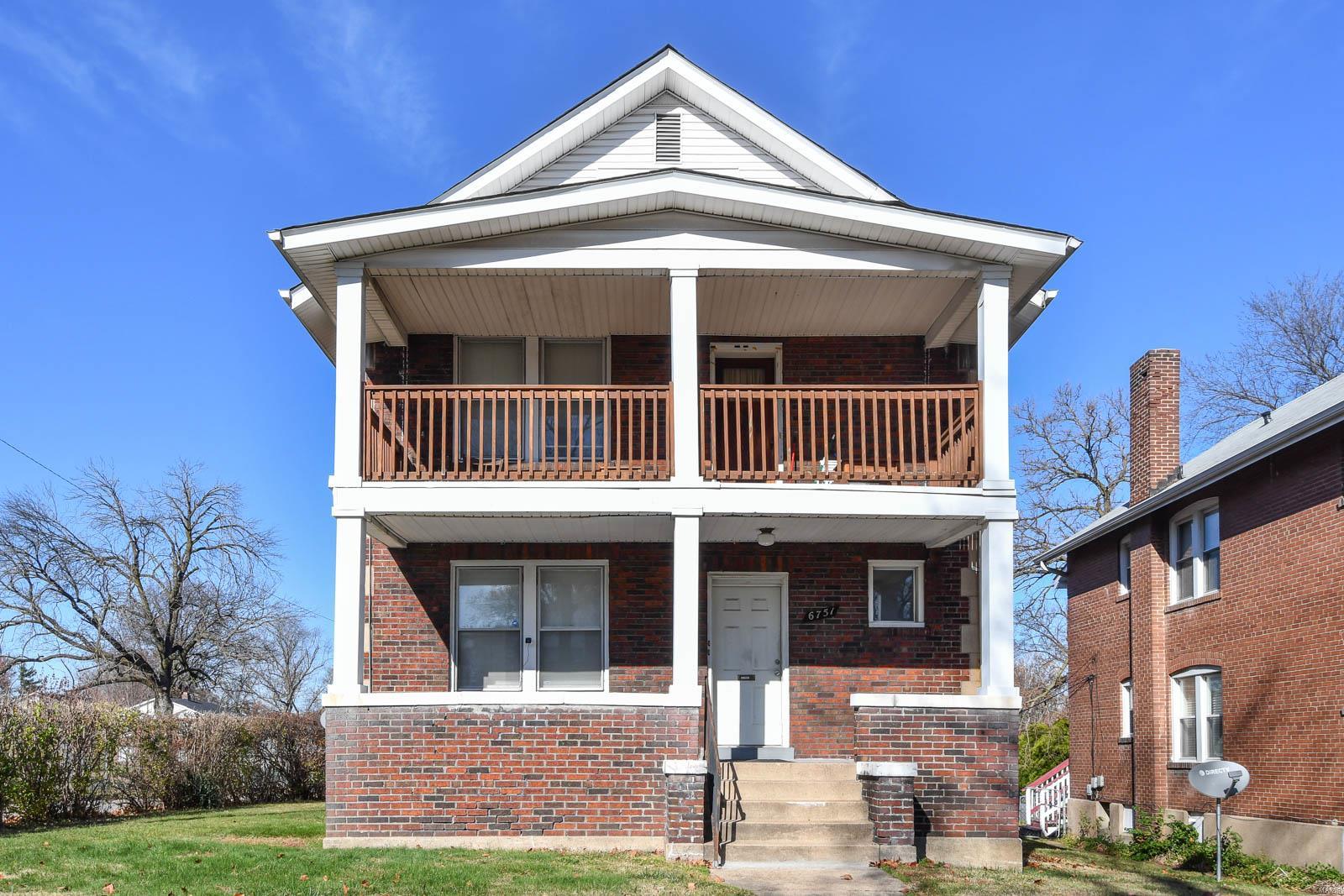 Great Investment opportunity in University City on large corner lot.  Brick two-family flat near school, shopping and public transportation. Both units are 2 bedroom / 1 bath apartments with hardwood floors throughout. Shared basement space and detached 2 car garage. Large living room leads to dining room space and has two nice size bedrooms with full bath with tub/shower combo. Private interior access to shared basement space with storage locker. Large backyard and each unit has nice covered front porch area. * Property offered in its current condition.  * Please do NOT disturb the tenants.