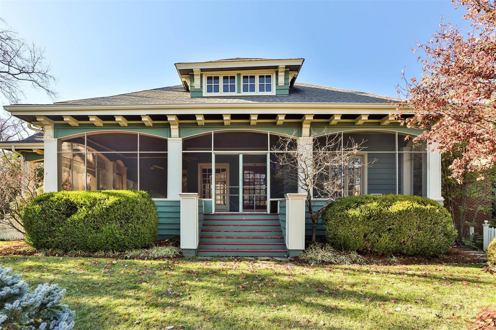 Enchanting home with carriage house in Old Town Clayton. One of the few remaining original homes on this street, 135 Linden is situated on a gracious 100' wide lot & showcases exquisite Craftsman architectural detail at every turn. The expansive screened-in porch and walls of windows provide sweeping views of the the intricate stone-walled gardens. Main floor features include: high ceilings, wood floors, hearth room w/ gas fireplace, built-ins, pocket doors, dining room w/ coffered ceilings, full bath, office, sunroom, kitchen w/ breakfast room that opens to deck. Second floor features include: Primary Suite, laundry room, full bath, and a spacious room w/ storybook built-in sleeping bunks. Follow the picket fence, past the "secret garden" to the two story carriage house. Above the parking level, there is an approx 800 sq ft stand alone apartment with kitchen, full bath, living space, & balcony. Rare opportunity to make this gem your own, or build a dream home in the heart of Clayton!