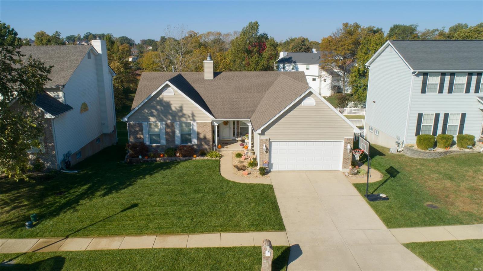 Enter your new gorgeous home and find total perfection behind this front door!  As you are greeted by the soaring vaulted ceilings in the Great rm, Kitchen, Dining rm, & Breakfast rm.  Great rm is complimented by gas fireplace & Atrium Ranch staircase. Enjoy the sun-filled sun room off the breakfast room - great for morning coffee.  3 bedrooms on main floor plus 2 full baths.  Master bed & bath are decked out for beauty! Lower level is professionally finished with 2nd fireplace and built in shelves. Wet bar offers comfort and peace during sports games or family holidays!! Enjoy the private 4th bedroom and full bath in the lower level also.  Great for out of town guests, teens that want their own place, or that private home office. Take a walk outside and enjoy this view!  Inground pool sparkles in the sun, outdoor kitchen with fridge and grill serves perfectly, and common ground gives peace and tranquility to everyone around.  New roof to be installed.  Possession at closing. Additional Rooms: Sun Room