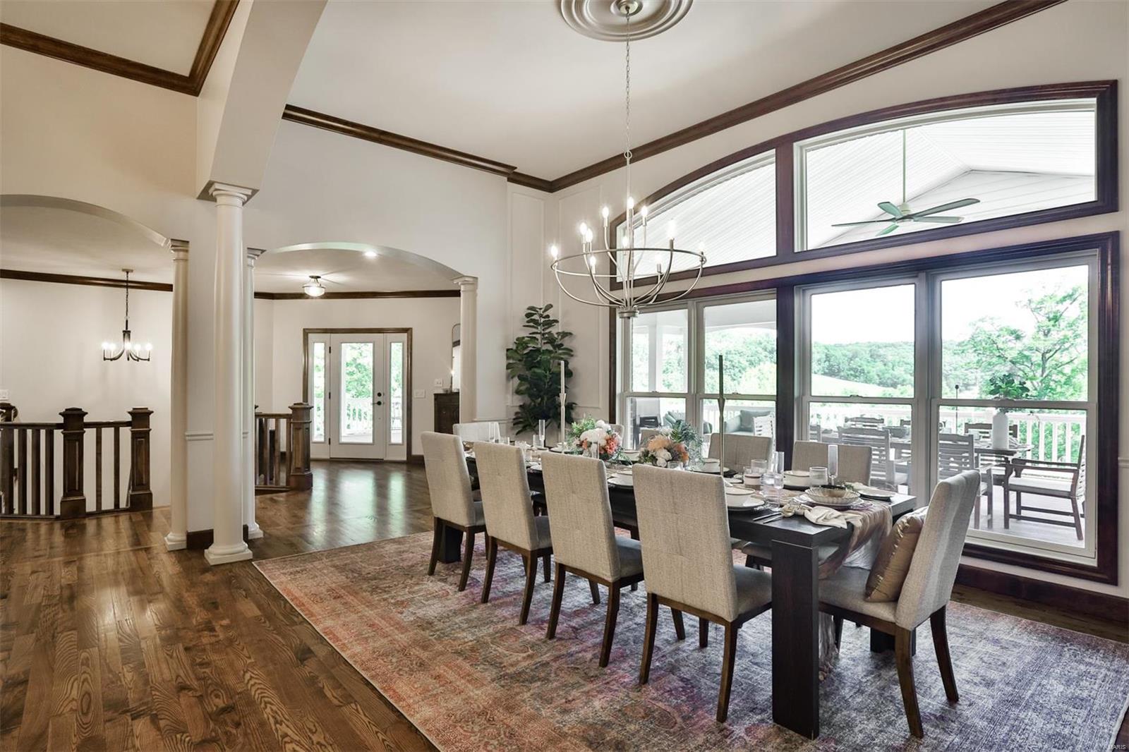 Imagine coming home to this exquisitely detailed, luxuriously private home in a great Wildwood neighborhood.  This entertainer's paradise has 6300sf of quiet luxury, with custom detail at every turn, extraordinary in design and finish.  5 bedrooms, 4F/2H baths, 2 laundry rooms, 4 vented gas fireplaces, oversized 4 car garage, 4+ acres.  Spectacular living spaces (formal DR, great room, breakfast room, hearth room on main).  Kitchen designed for the most discerning of cooks, with GE Cafe appliances  and tons space to prep, entertain, and relax. Primary suite is perfection, and guest suite allows for main floor living! Outside: 1677 sf of wrap-around porch (940sf covered) and composite deck with 1677 sf of patio space underneath.  Grand staircase leads to 2833 sf of entertainment space in LL: slate tiled rec room and lounge/FR; custom Speakeasy wetbar w/ appliances, powder room, laundry, and a massive amount of storage space!  Must-know details attached to MLS. Passed county.
