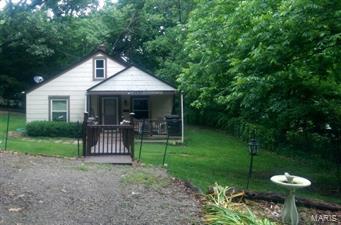 INVESTORS – Perfect home to add to your inventory.  All big ticket items where replaced in 2008 (Roof, windows, Hot Water Heater, Furnace, AC Unit).  Hardwood floors throughout most of the home. Paint the inside and move your renters in.  Last house on dead end street making parking a non-issue. Be sure you make plans to see this one, it won’t be on the market long.