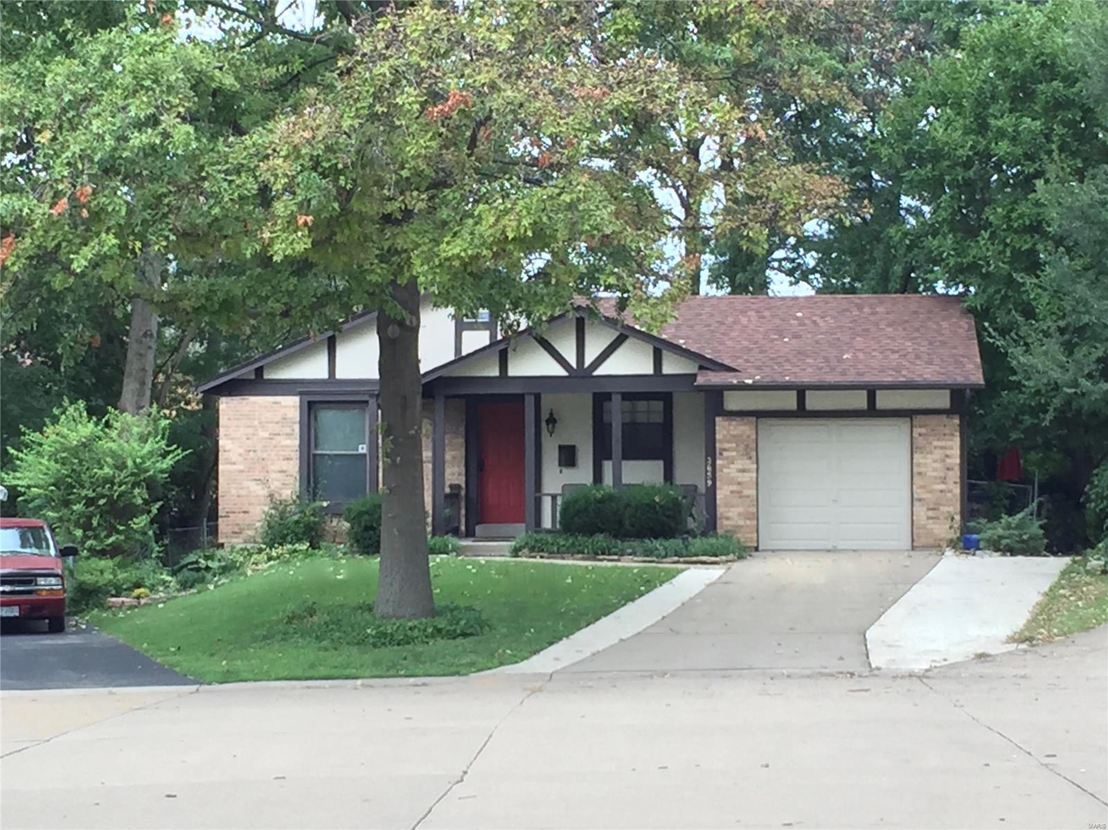 This home must be seen to be appreciated. Exceptional yard filled with perennials, mature trees and rock paths and borders. Excellent access to highways, shopping schools and amenities.  Close to Creve Coeur park, HWY 70, 270 and 364. Less than 10 minutes to Lambert Airport.  
Home has spacious bedrooms, wood floors in entry and hall.  Carpet with a like new look is neutral and soft.  A full, dry basement with washer and dryer and built in shelving is ready for expansion.  Walk to Triple AAA Pattonville High.  A real value - won't last!!