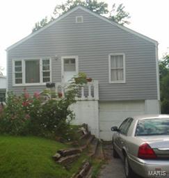 New Vinyl siding and Gutters on this 2 Bedroom 1 Bath home in Overland.  Kitchen Has a pantry and newer neutral color tile floor, Kitchen has entry to rear deck and yard, and also has door to basement from Kitchen.  Living room  is open to the dining room and both have hardwood floors.   Some updated insulated windows in dining room and 2nd Bedroom.  Home has charm needs elbow grease and renovations in several areas.  Main bath has newer ceramic tile and pedestal sink, tub needs retiled, good size linen closet in this bath.  Basement is full and has tuck under garage in one section.  There are some partially finished rooms in basement that need renovation.  Laundry is in the basement, that has a walk out door to rear fenced  yard with gates on both sides of home.