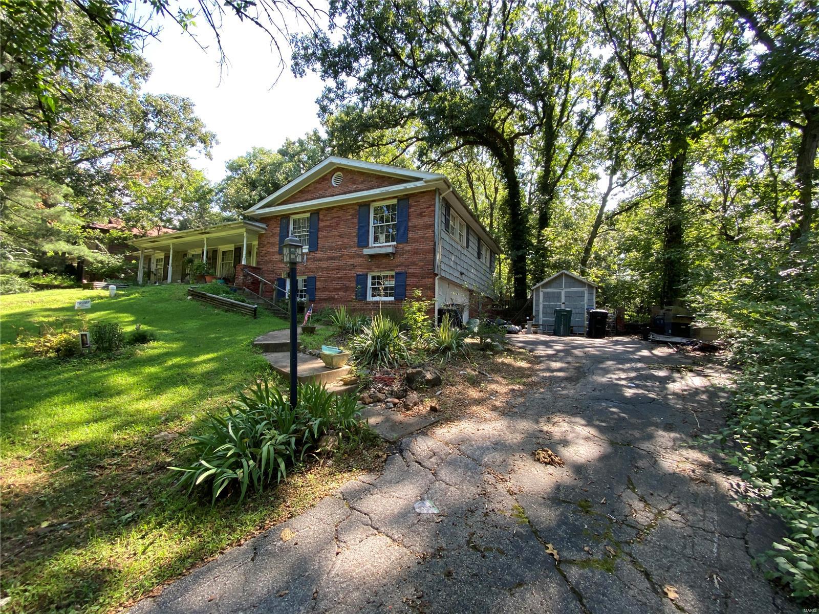 1.4 ACRES OF AMAZING OPPORTUNITY AWAITS IN LINDBERGH SCHOOL DISTRICT 

Here is that perfect LOT to build your dream home or possible REHAB if you have the vision.  

HOME VALUES OVER $500k in the neighborhood.  Please note that this is a FULL GUT REHAB or TEARDOWN! 

Nestled on a quite street with park like settings this ORIGINAL ONE OWNER HOME had it all... In-ground pool with pool house,  nice flat patio for back yard BBQ's and plenty of space to entertain inside...  ON almost 1.5 acres

PROPERTY BEING SOLD AS-IS