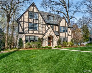 This spectacular English Tudor in the heart of Sherwood Forest   features 5 bedroom, 4.5 updated baths including 2 master suites.  Over 5000 sq ft of luxurious living in pristine condition. Architectural award wining kitchen/family room addition with fantastic floor to ceiling windows, gas fireplace with dramatic views of the 1/2 acres lot.   Charming screening in porch with Brazilian wood ceiling makes everyday feel like a vacation.  Convenient first floor mud room with washer dryer and 2nd floor laundry area.  All of this plus an attached two car garage, slate roof, updated systems and walking distance to downtown Webster's shops and restaurants.