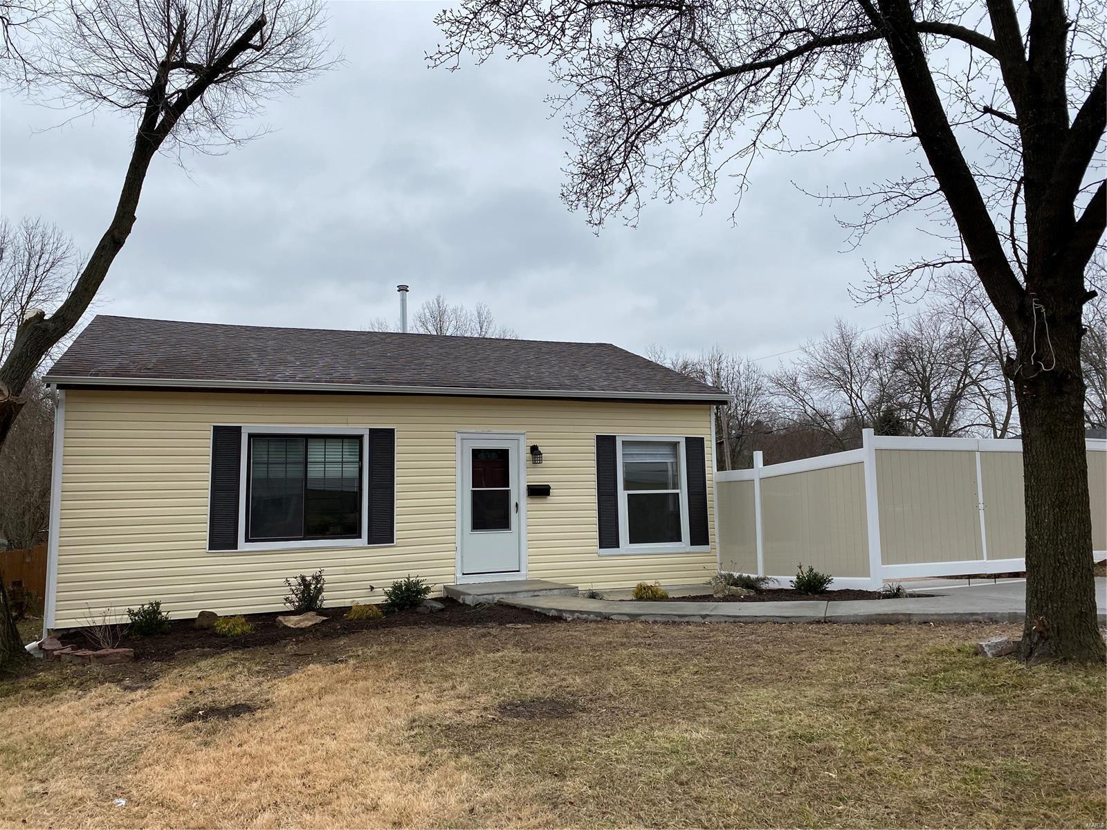 Quality abounds with this lovely 2 bedroom home.  This home features updates through out the home featuring all new floors and doors!  This home is conveniently located near major highway access and great local eating and shopping.  Check out the 2nd building perfect for a man cave or private workshop.  Schedule your showing today as this property will not last long!