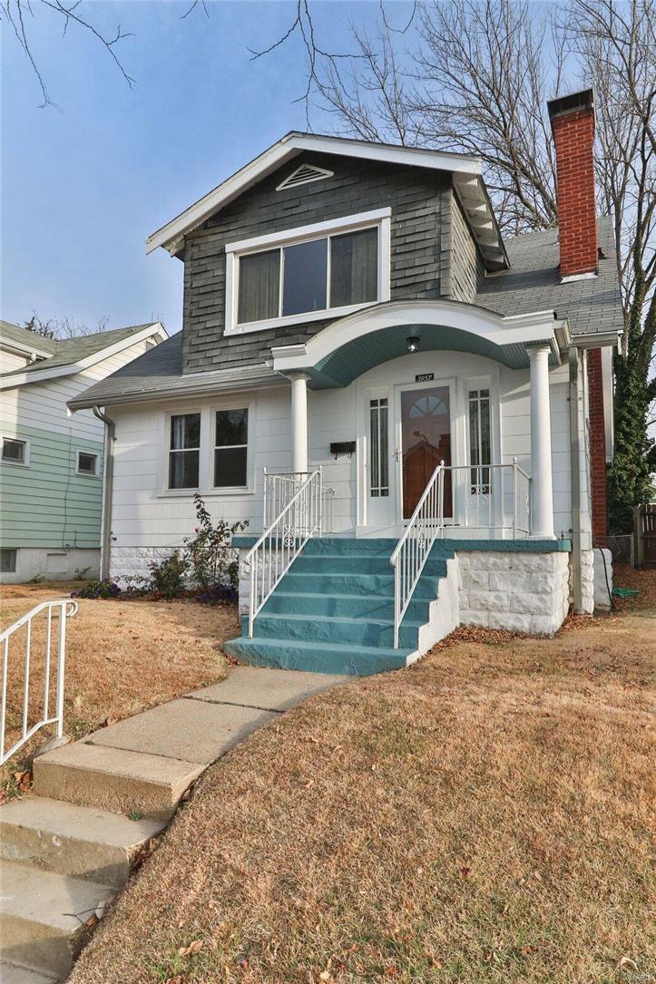 On a quiet street just blocks from Carondelet Park is this charming home with lots of curb appeal Original hardwood floors throughout, living/dining room has open floor plan featuring stain glass windows and wood burning fireplace. Updated kitchen has newer laminate flooring, walk-in pantry, stainless steel gas cook top, refrigerator and dishwasher. First floor features a full bath, first floor bedroom has lots of closets and built-in desk area. Second floor has two additional bedrooms, the master is spacious with lots of light. There are walk-in closets in the master and hall and attic has a walk in storage area with all newer insulation. There is a 1/2 bath between the master and third bedroom. The lower level has two finished rooms with closets, a full bath and PBC main stack. There is a small deck area right off the kitchen overlooking the fenced back yard.