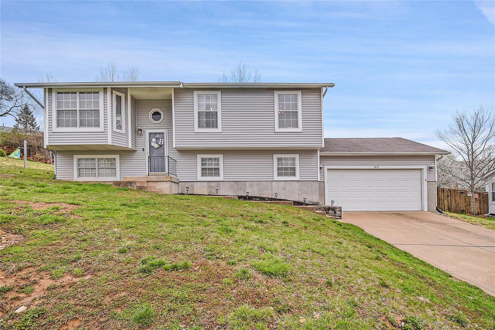 Now is your chance to get into desirable Dutch Mill Farms! This 4 bed, 2 bath, 2-car garage split foyer home offers vaulted ceilings, newer wood-look lam flooring in the Living Rm, ML hall & Beds, fresh paint throughout, newer A/C, good size & fully fenced backyard, insulated garage & more. Living Room with bay window with open flow into the Breakfast Room that accesses the maintenance-free deck...Great space for entertaining! The Kitchen has a good amount of storage including a pantry & has a newer dishwasher (refrigerator included). 3 ML beds and full Hall Bath with tub/shower combo, CT floor, & hall linen closet. The finished lower level includes a Family/Rec Rm and additional room for sleeping that has an attached full Bath w/CT floor & shower. Arnold amenities minutes away...shopping, parks, & convenient to highways for commuters. Make this your new home!