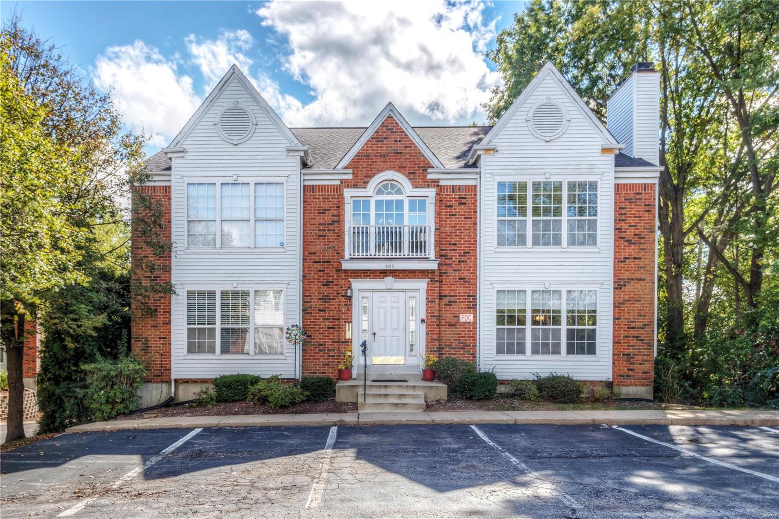 Style, Sophistication & Attention to Detail are realized the moment you walk through the front door of this completely renovated 2 Bedroom/2 Bathroom Condo! Look no further, SUPER SHARP, SUPER CLEAN! Better than brand new, Ground Floor Level Condo. TOTALLY UPDATED, spotless, 2 Bedroom, 2 Bathroom. New Light Fixtures, New Flooring, New Bathroom Vanities & Tile Floors, NEW HVAC. Crisp White Cabinetry, Granite Counters, New Stainless Appliances. Abundance of windows adds to the welcoming & spacious feel of the property. Cozy wood burning fireplace in the living room. Master Bedroom with Master Bathroom, large walk-in closet and slider to cozy deck. White 6 panel doors, Washer and Dryer in Main Floor Laundry STAY! 1 CAR GARAGE plus additional parking. Storage room in basement! Convenient location near Clarkson and Clayton, minutes from awarding winning Rockwood Schools.  WALK to stores, restaurants, Parks, etc. Location: Ground Level, Suburban
