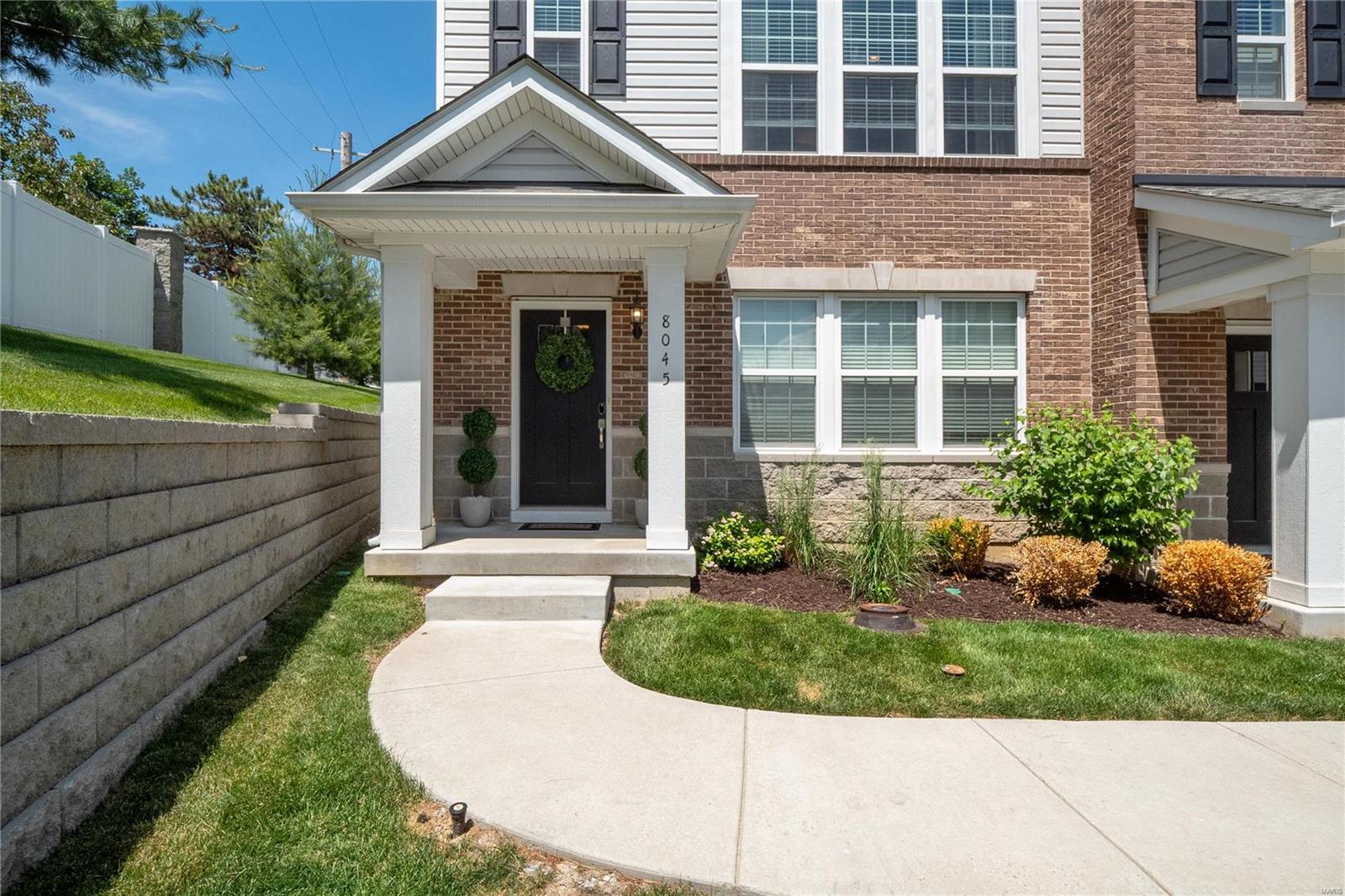 Rare find of luxury and convenience. Located in top rated Clayton School district. End unit, 3 bedroom, 2.5 bath home. This is the maintenance free lifestyle you have been looking for. Walk to restaurants, the Galleria, or hop on the Metro Link and get anywhere in minutes. If the neighborhood and lifestyle are not enough this home has everything. The living area is an entertainers dream. You will love the specious kitchen with custom cabinets, gas cook top, double oven, range hood, massive center island with quartz counter topped breakfast bar. The space opens to a dining area on one side and a luxurious great room featuring high ceilings, tall windows, and a walk out to a patio balcony. The master suite boasts a tray ceiling, huge walk in shower, his and her sinks, and a walk in closet. Second floor laundry is ideal and just down the hall from the 2nd and 3rd bedrooms. The 2 car garage is oversized and has room for plenty of storage. This one won't last long!