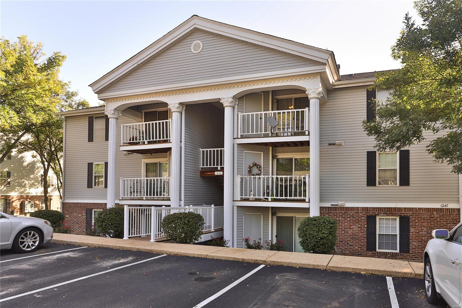 Convenient location is an understatement.  Your future condo sits at the intersection of Olive Blvd and 141, just moments from I-270.  Endless shopping and opportunities at your fingertips.  Head to the pool after a long day of work, or take your dog for a walk around the property.  The beautiful hardwood floors grab your attention the moment you open the door.  VAULTED ceilings give you room to breathe with no one above you.  Carpet in both bedrooms was just installed in August of 2019 and has not been lived on by anyone.  Two full bathrooms have also been renovated.  If you don't want to throw your money away on rent, but you are also not ready for all of the maintenance that comes with owning your own house, this is the PERFECT opportunity for you. Location: Upper Level