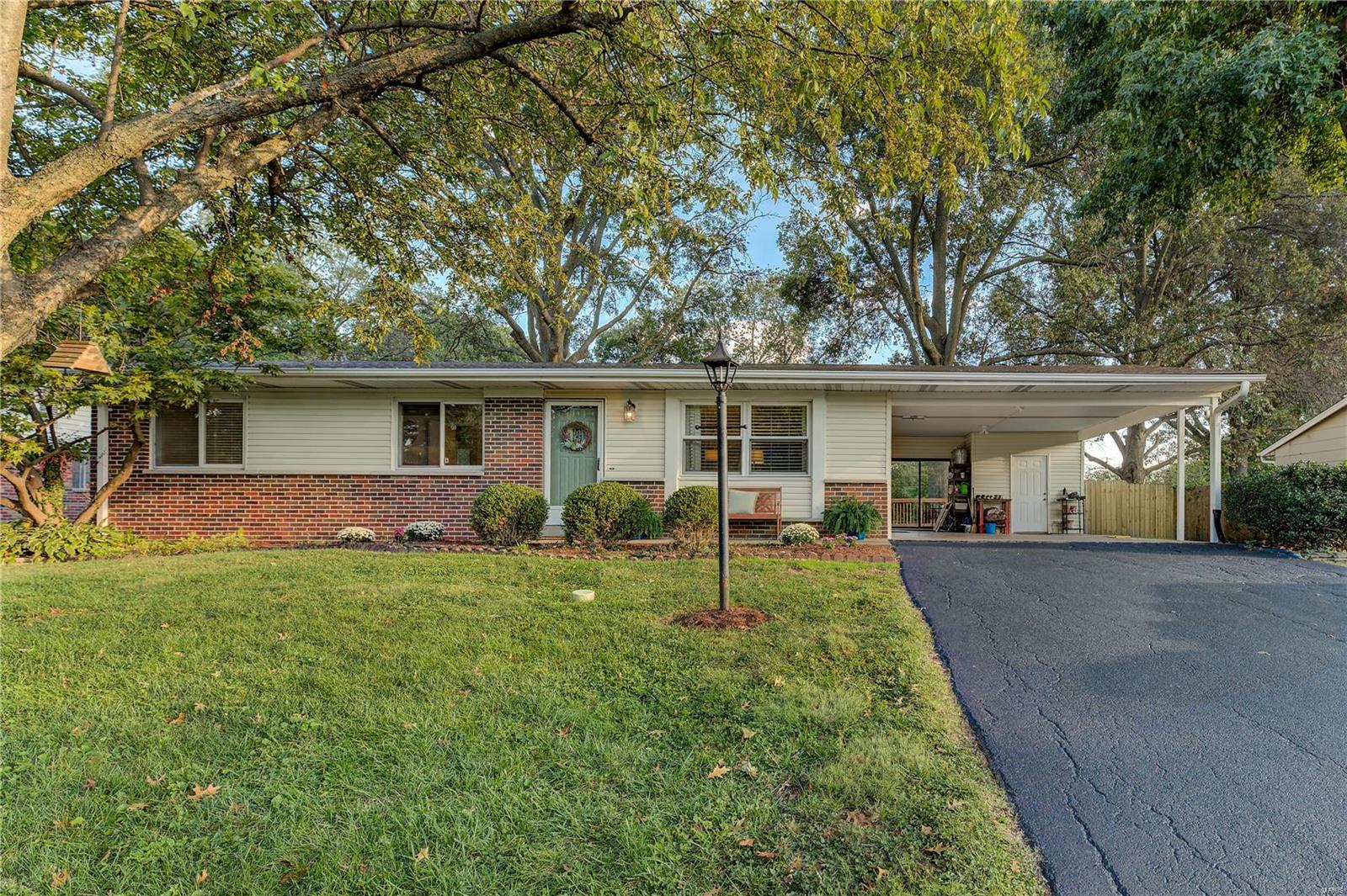 Open House Sunday 1-3. Perfect opportunity to be the next owner of this wonderful 3 bed/1.5 bath ranch home in Parkway Schools. This home has all the features today's buyers are looking for. Beautiful hardwood floors, tons of natural light shining through the large windows, huge fenced backyard perfect for kids, dogs and adults, great deck for outdoor entertaining or relaxing. Downstairs features a carpeted area perfect for hanging out or a work from home office, a fun retro bar area and a bonus room currently used for working out. Lots of storage space in the unfinished portion of the basement where the laundry facilities are located. An oversized 2 car carport has a storage closet and access thru the slider out to the deck. The new shed in the backyard stays. Exclude the Budweiser sign, washer, dryer, freezer in basement. Recent updates include Roof 2019, siding, gutters 2016, Furnace/AC 2017, some painting, oven, dishwasher and microwave 2021.