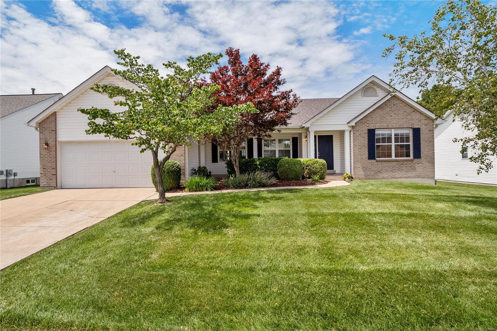 Welcome to  this stunning custom-built ranch by Herb Stewart, offering over 3200 sqft of exquisite living space. The main floor boasts 3 bedrooms and 2 baths, featuring wood floors in the entryway and a vaulted great room with a cozy fireplace. Entertain in the updated eat-in kitchen with gorgeous wood floors, quartz counters and stainless steel appliances, or enjoy meals in the adjacent dining room. The fully finished lower level impresses with a spacious family room, a wet bar, a private office, a full bathroom, and the potential for a 4th bedroom. Step outside to a charming patio on a level lot, perfect for outdoor gatherings. With a 2-car garage and a location in a fantastic neighborhood close to everything, this home is packed with too many updates to list. Don't miss out on this perfect blend of luxury and comfort!