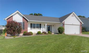 Spacious ranch home with open floor plan! Vaulted ceilings run through the main living areas and a there area a ton of windows for natural light. Living room with fireplace, brick surround, white mantel, and plant shelf. Kitchen and dining area is huge with plenty of cabinet space, center island, recessed lighting, main floor laundry off the kitchen. A bay window with French door opens to back patio off the dining area. Vaulted master bedroom suite with walk in closet, luxury bath with separate tub and shower, dual sinks, tile floor. Two additional main floor bedrooms and full bath off the hall. Open spindles to the lower level just waiting for your finishing touches! Great level fenced back yard with patio and above ground pool. Nicely landscaped front yard with covered front porch. Additional features include white six panel doors, ceiling fans in bedrooms, updated light fixtures, rough in bath in lower level, this home is 10 years young and move in ready!