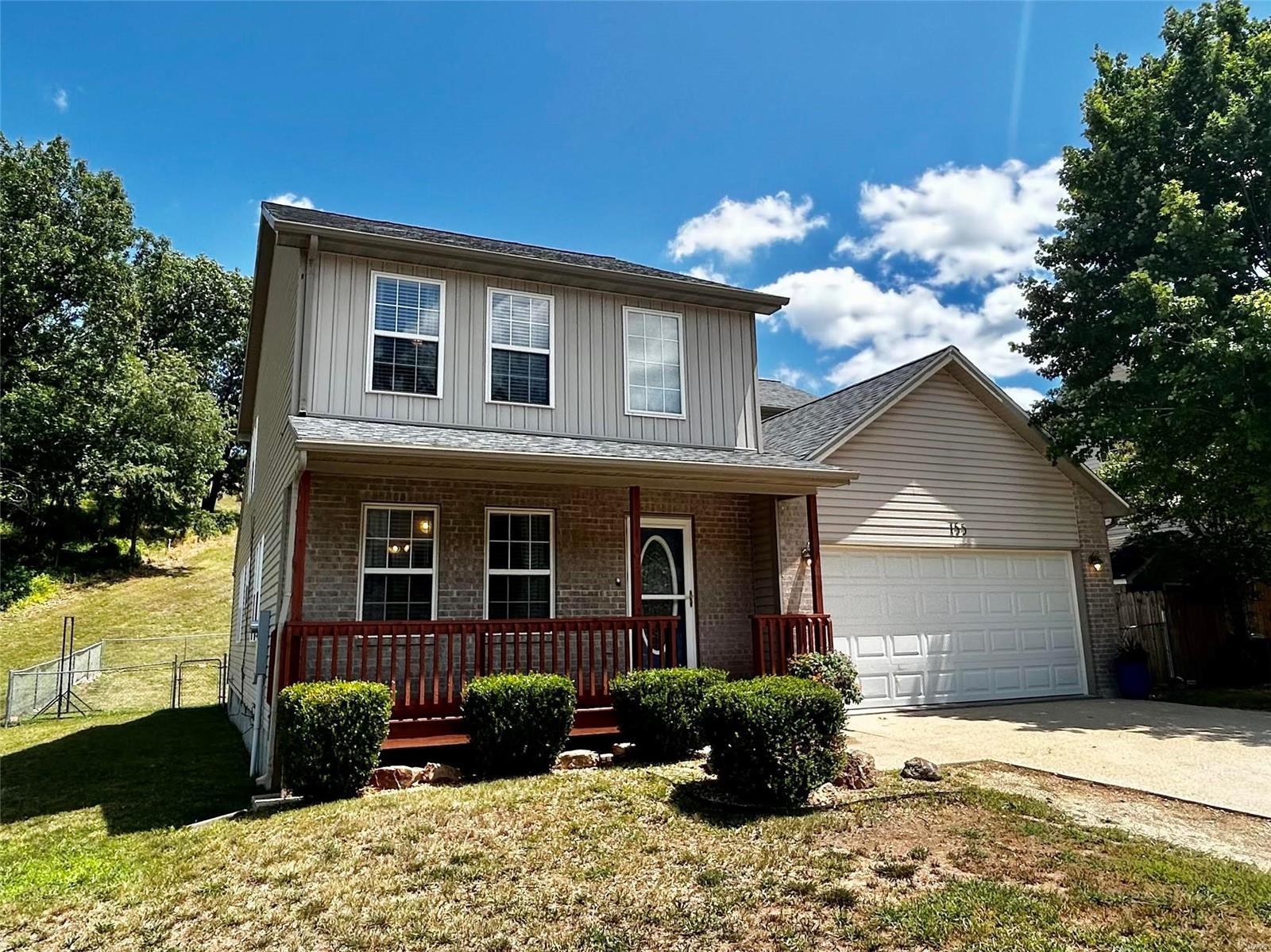 You will fall in love with this adorable 2 story home! On the main level, enjoy the kitchen with all stainless appliances, center island and a walk-in pantry. The family room sits just off the kitchen and leads out to the fenced yard and brand new deck!  The master suite is on the main level and quite spacious.  Relax in the jet tub or go for a quick clean in the separate shower. This bathroom provides dual sinks and a very generously sized walk-in closet.  The main level also has a living room, 1/2 bath and laundry room. Upstairs you have 3 LARGE bedrooms and a full bath.  This home has a newer roof, newer lower level HVAC (it's a dual system), newer flooring/carpets, newer dishwasher, plus the storage on this home is very good! Located in Hickory Valley Subdivision, this great location is around 10 minutes to the main gate of Ft. Leonard Wood and close to shopping, restaurants. So if you're looking for your next home, why not check out this one?