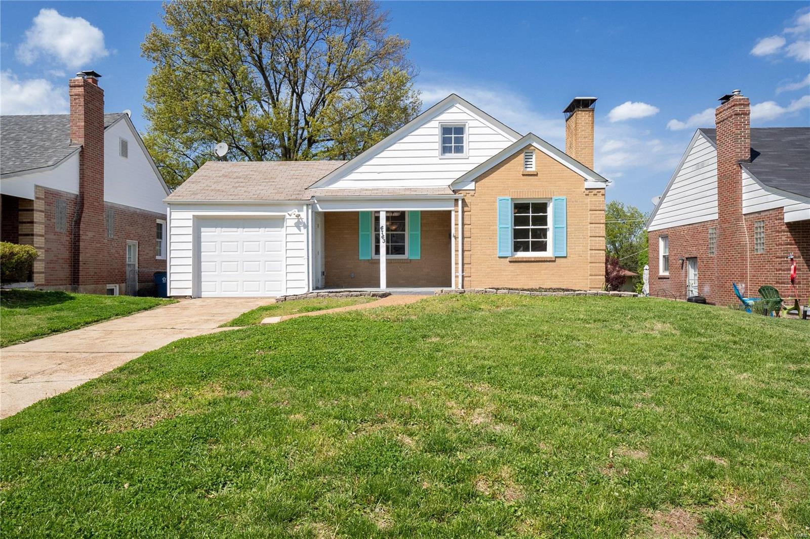 Live on this gorgeous tree lined street in the highly sought after Affton Heights neighborhood! Professionally updated with an open floor plan & a huge en-suite master bedroom with your own fabulous bathroom! Another beautifully updated full bath & two bedrooms lend plenty of space for growth, beautiful blonde wood floors lead to the open living room with a cozy fireplace & into the separate dining room where you can spend your evenings with your friends over dinner! A custom kitchen boasts quartz counter-tops, gorgeous flooring & bright colors where anyone would want to spend time creating delicious dishes! Downstairs an unfinished walk-up basement with plenty of space for storage & outside is a great back yard just waiting for the summer nights with friends! The HVAC, water heater,stack & lateral were replaced in 2016 & the seller has even included an already registered HSA Home Warranty for Free to the buyers!
