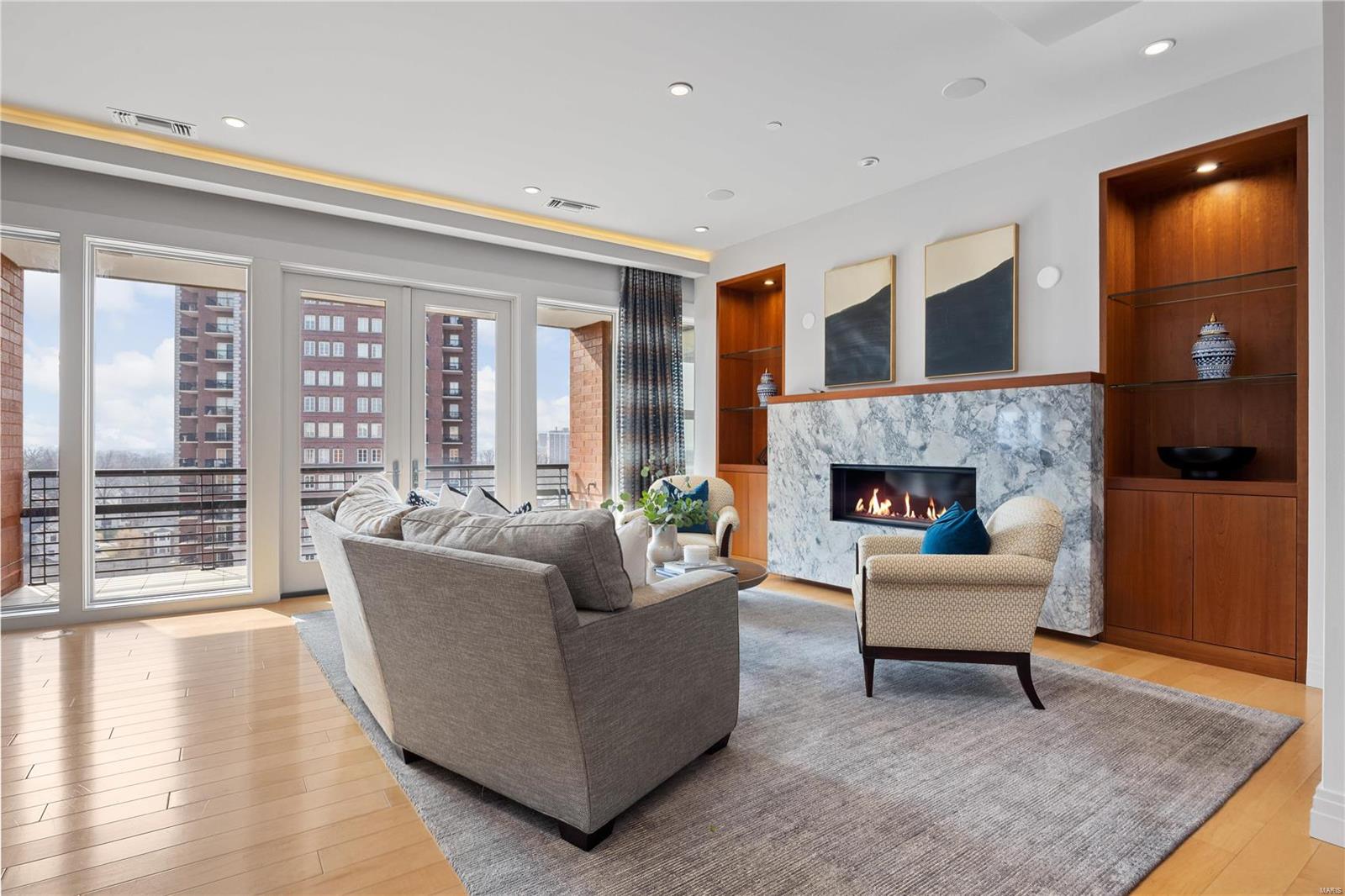 One of the finest examples of Pure Luxury living in Beautiful downtown Clayton. This Unit is located on the 8th flr w 2 Terraces & wonderful views of Clayton & on a clear day the skyline of St. Louis. The sophisticated open flr plan w 3,890 square feet w high end finishes, 9 & 10 feet ceilings w flr to ceiling windows & drs, wood flrs, 2 gas fireplaces, bar and so much more! The cooks kitchen with oversize Island & walk-in pantry w Top of the line appliances, Wolf, Subzero, Gaggenau and a built-in Miele coffee machine sets the mood for entertaining with 2 dining areas that flow so easily and plenty of sitting room to relax. The Handsome Primary Suite with custom closet and an oversize luxury bath plus it's own private terrace is a must see! On the other side of the unit is 2 bd rm ensuites perfect for visiting guest or family. Laundry rm, powder rm, 3 car parking spots, 2 storage units and a dog park on the 3rd flr completes this one of a kind opportunity. Location: Upper Level