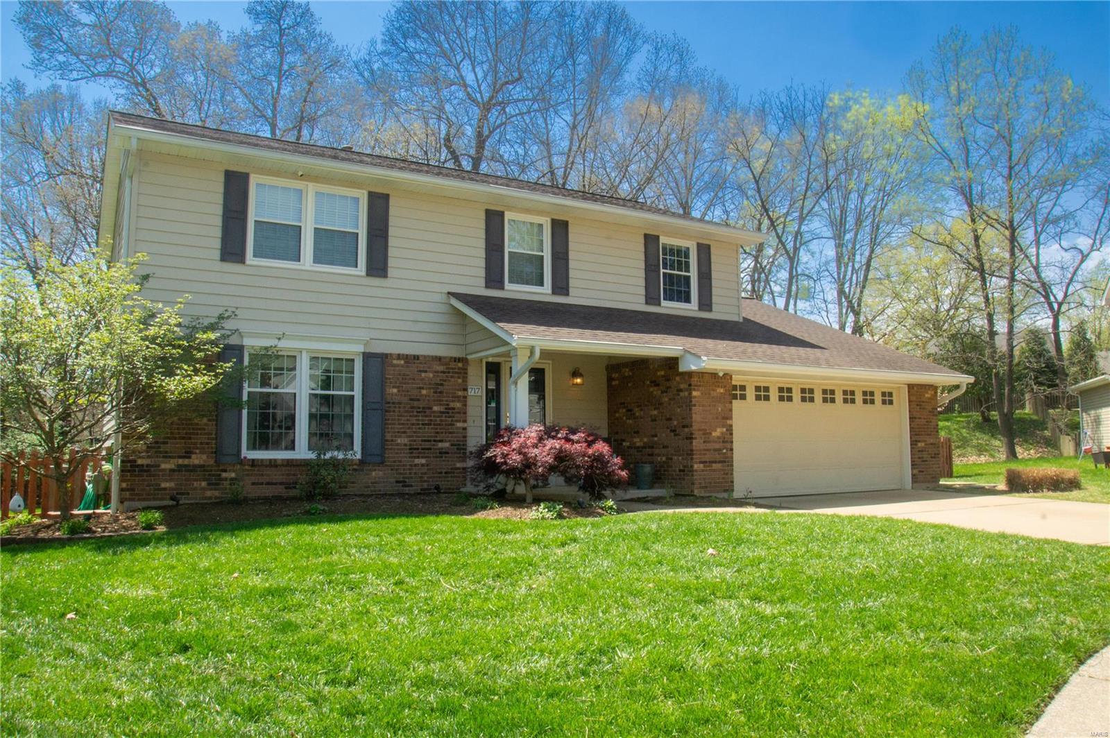 Seven Oaks subdivision!! Traditional 2 story home with open floor plan and modern updates! First floor features hardwood throughout and spacious, renovated kitchen with ceiling height cabinets, crown molding, and lots of natural light.  Family room has fireplace and doors that lead out to a large private patio and park-like backyard.  The fenced back yard is one of the largest in the subdivision, boasting mature trees, beautiful landscaping, and brick fire-pit. Perfect for entertaining and summer nights catching fireflies! Upstairs has updated carpet and molding, a master bedroom with ensuite and large walk-in closet, and 3 additional bedrooms and full bath. The basement is partially finished with a recreation room and large laundry room with wash tub and lots of storage. The house is situated in a cul-de-sac and close to Parkway South Schools and highly-rated Barrett’s Elementary.  A very desirable location!
