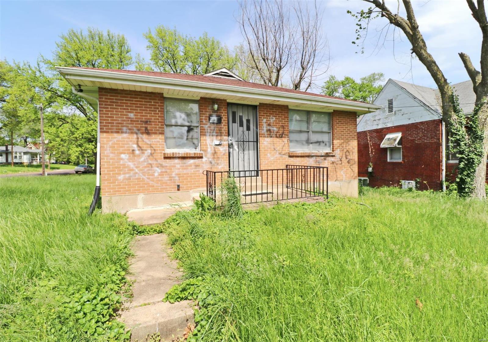 Loaded with potential! This charming house on a BIG corner lot is ready for your ideas. Great sized living room leads you to the large eat-in kitchen. Three bed rooms all on the same level and more room in the basement is waiting for your finishes! Attached garage and partially fenced in backyard. Convenient location for quick highway access. Turn this house into your dream home or make it into a great investment! It is also available to purchase with two other houses as a package deal, call now! Won't last long.