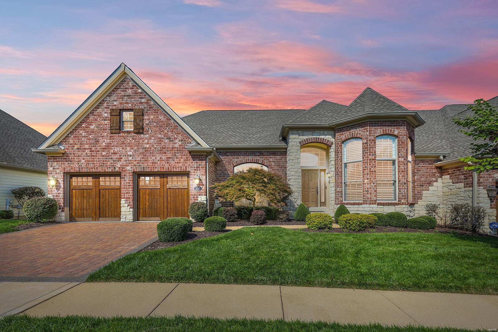 Spectacular Ranch-Style Villa redesigned w/Architect, Dave Schaub & completely renovated by custom home builder, Greg Terbrock! Boasts bright/open floorplan, 2 Bd, 4 Bth (2full/2half) & 2193 Sqft, not including the 1300 Sqft of finished LL space! Wide plank hardwoods in the Foyer, stunning home Office which can be converted into a 3rd Bd if desired; find crown molding, interior solid core doors, built-in sound system & recessed lighting throughout. Dining Room w/columns, rounded corners & arched openings, Great Rm w/wall of windows, plantation shutters, Francois & Co crushed limestone FP surround & mantel, Kitchen w/custom cabinetry, granite, top of the line appliances, backsplash, island & banquette seating! Master Suite w/custom W/I closet; Bth w/dual vanity, heated floors, MTI SculptureStone soaking tub & separate shower! W/O LL w/Rec Rm, FP, wet bar, add’l Bd & updated full Bth. Relax on the covered, screened-in deck w/built-in speakers & enjoy the view of the lake! Great location! Location: End Unit, Ground Level