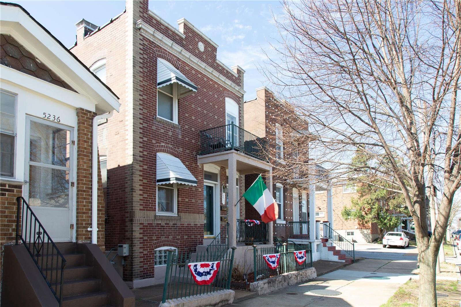 Looking for some income? Large home brick that would be great as owner/renter investment, or easily convert to a single family home. Location is great with close amenities to The Hill. Entire house is nicely updated with large living and bedrooms. Upper level has large original exposed brick wall and all brand new windows. Backyard is large and flat with 2 car garage. Updated electric about 3 years old. Water heater and furnace are less than 5 years old. All of the big updates have been done, come in and make this one yours!