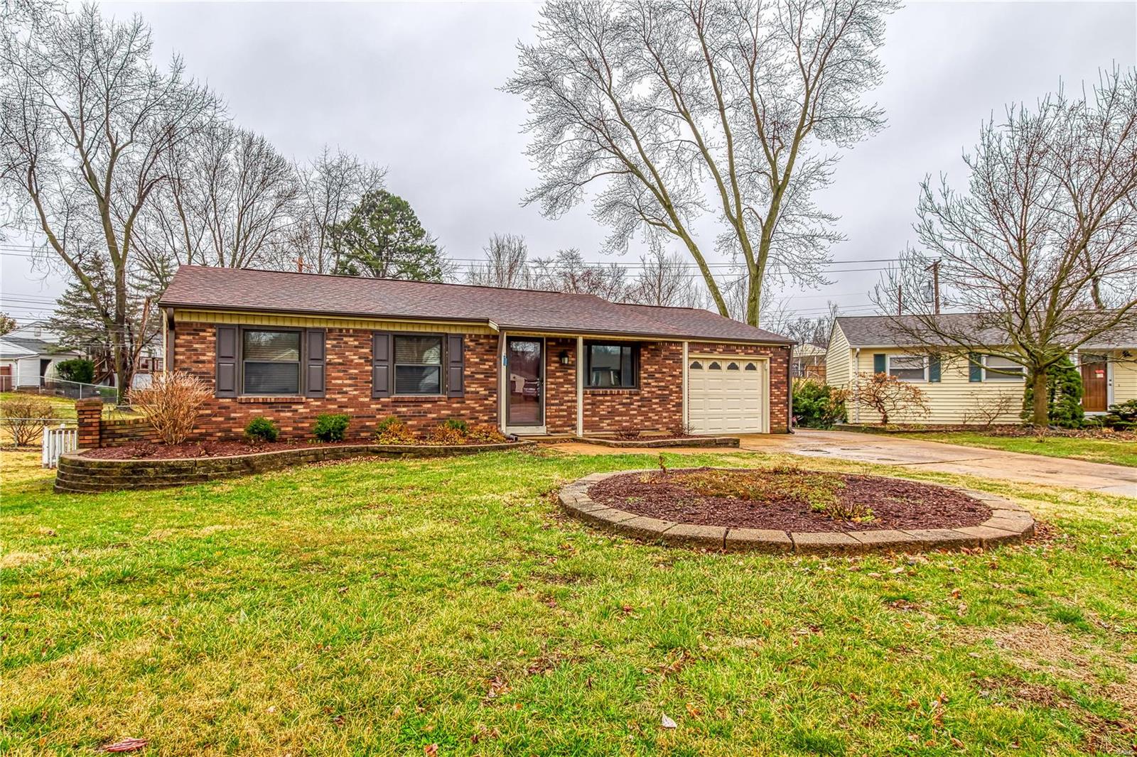 Totally Awesome home!  Completely renovated!!! Sits on a court, fenced lot, backs to common ground and trees.  Amenities include: Roof 2011, furnace and water heater 2007, back storm door 2020, front door 2017, kitchen door custom fire safe fiberglass 2017. In 2012 entire Kitchen was remodeled with dark oak 42 inch cabinets, counters, breakfast bar and ceramic tile. In 2017 all matching GE Slate appliances, ceramic tile backsplash & undercabinet lighting.  Refrigerator, bar stools, window treatments and bathroom decor stays. Wonderful refinished hardwood floors thru-out and special millwork ceiling trim thru-out. Family room addition with woodburning fireplace. Other amenities include covered porch, patio, attic fan, ceiling fans, painted walk out lower level, insulated and drywalled garage, pull down attic entrance, and much more. The home shows incredibly. Call agent to tour.