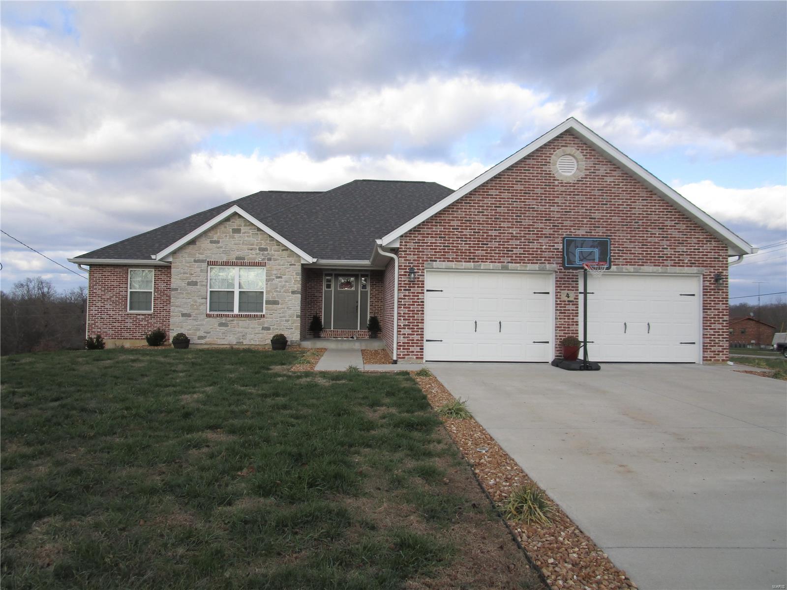 A choice location when you live in this 3 bedroom, 2 bath ranch home just minutes away from city limits, dining and shopping. Or spending the evening at home on your lower level patio area or watching the stars from your very private balcony deck.  A quality home built in 2018 in a terrific location.  It offers the best in gracious living space with an unfinished walk-out basement waiting for your personal touch. There is plenty of room in your back yard to play! This beautiful home sits on a corner lot (.78 ac. +/-) and is all yours to enjoy.  You will find this home tasteful & elegant.