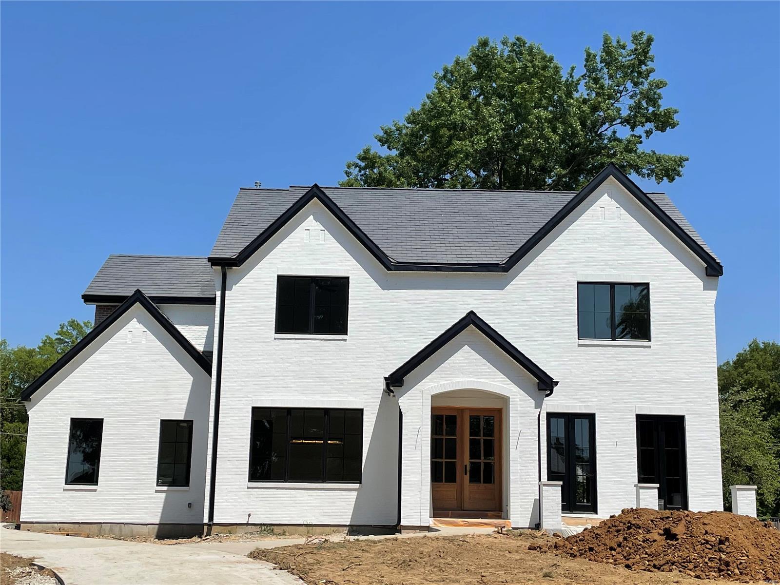 *** New Home To Be Built*** Another beautiful new custom home by MRM Manlin Development Group. Move in ready in 2021. National award winning Clayton Schools. Beautiful 100' x 150' lot - the last remaining buildable lot in the exclusive private Lake Forest subdiv. Approximately 4591 square ft of total living space. 5 bedrooms, 4.5 baths. Outstanding brick & stone exterior and high end appointments throughout the interior make this a showcase home. 9' ceilings on both the 1st & 2nd floors. Spacious rooms throughout. Kitchen features Wolf gas range and microwave drawer, Sub-Zero refrigerator, Asko dishwasher, walk-in pantry, planning desk and lots of extras. MBR suite with "his & hers" custom closets. Main floor laundry, office, mudroom, great room, dining room,breakfast room. Finished lower level family rm with wet bar, 5th bedroom & full bath. Crown molding, security system, inground sprinklers. Property has room for an inground pool. Just minutes to downtown Clayton, schools, highways. Additional Rooms: Mud Room